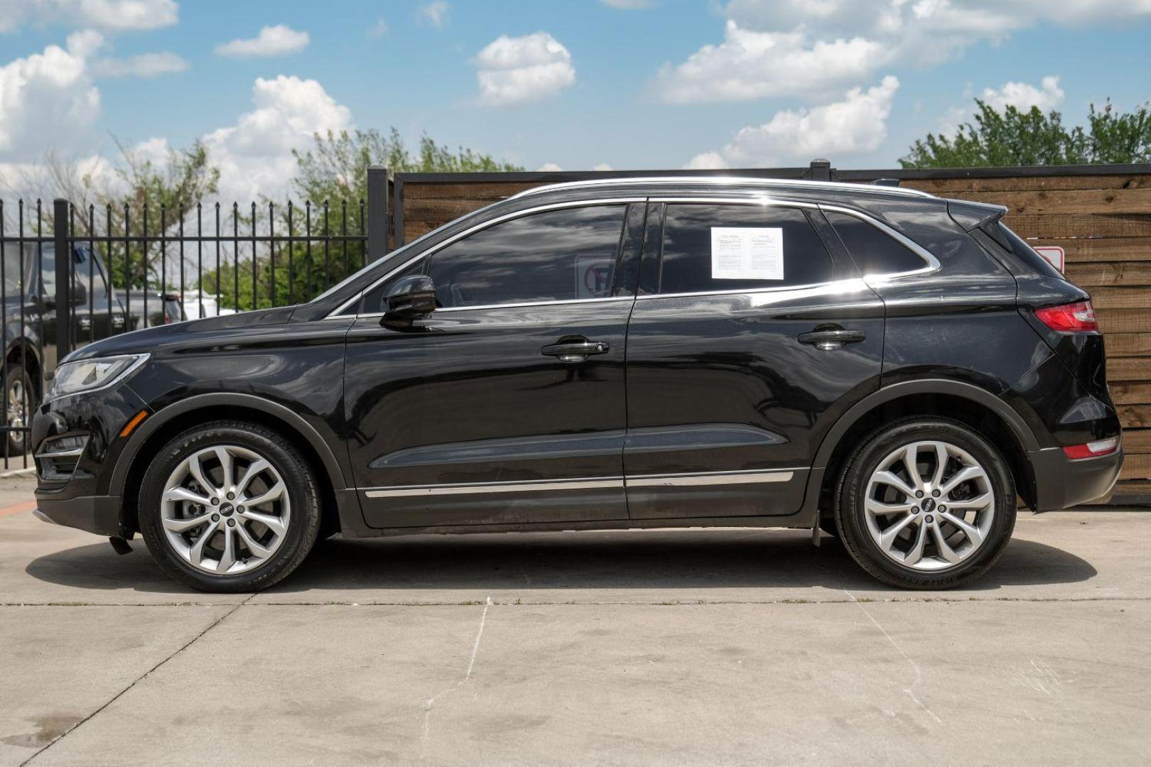 2015 black Lincoln MKC FWD (5LMCJ1A9XFU) with an 2.0L L4 DOHC 16V engine, 6-Speed Automatic transmission, located at 2401 E Main St., Grand Prairie, TX, 75050, (972) 262-4440, 32.748981, -96.969643 - Photo#13