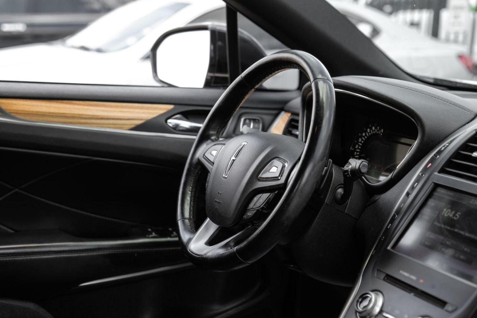 2015 black Lincoln MKC FWD (5LMCJ1A9XFU) with an 2.0L L4 DOHC 16V engine, 6-Speed Automatic transmission, located at 2401 E Main St., Grand Prairie, TX, 75050, (972) 262-4440, 32.748981, -96.969643 - Photo#16