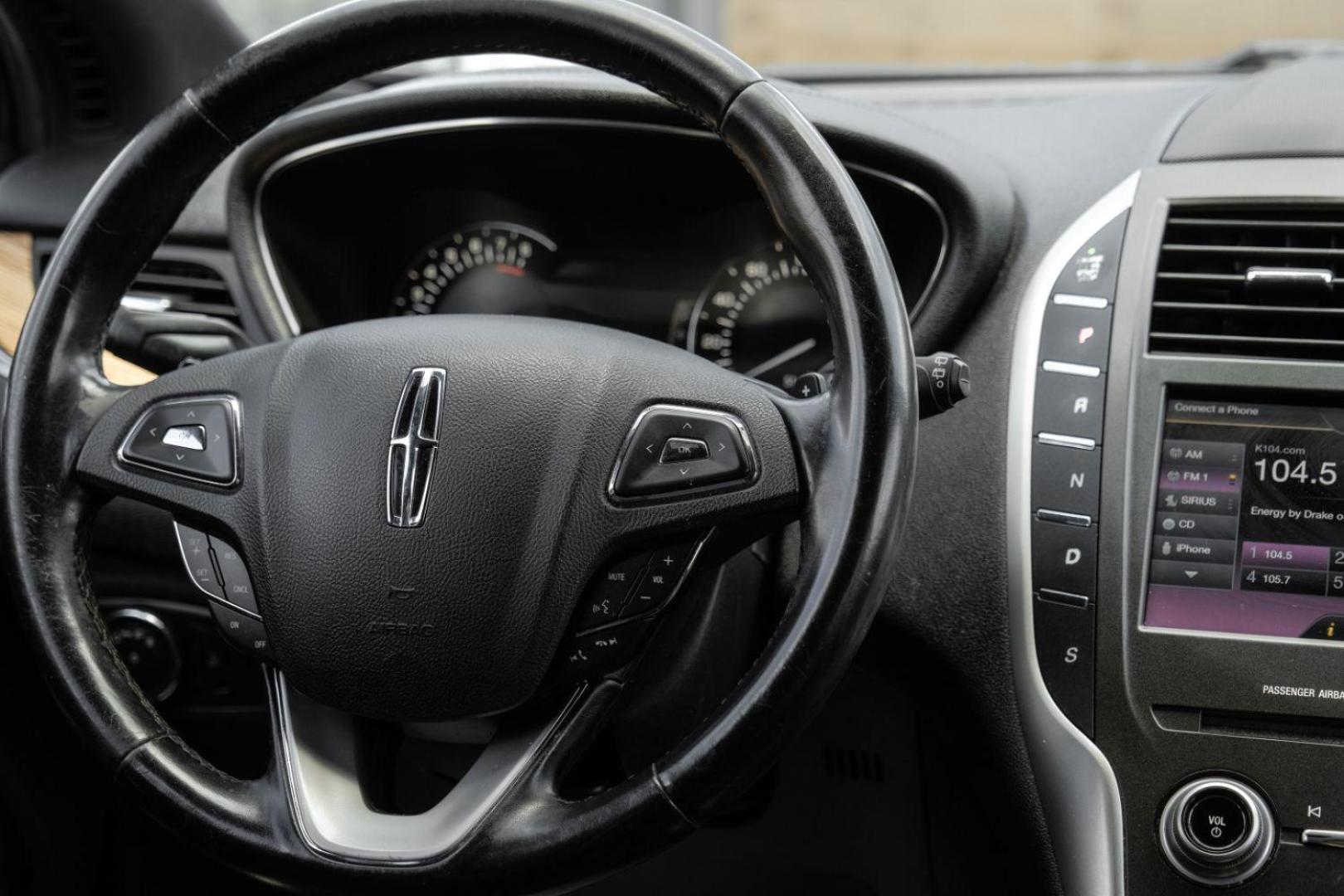 2015 black Lincoln MKC FWD (5LMCJ1A9XFU) with an 2.0L L4 DOHC 16V engine, 6-Speed Automatic transmission, located at 2401 E Main St., Grand Prairie, TX, 75050, (972) 262-4440, 32.748981, -96.969643 - Photo#18