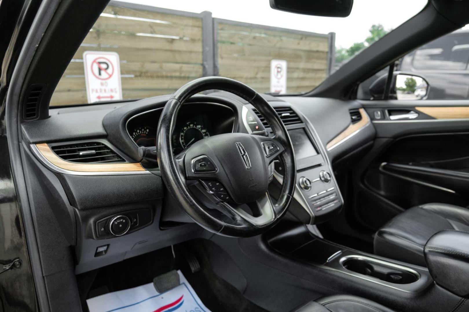 2015 black Lincoln MKC FWD (5LMCJ1A9XFU) with an 2.0L L4 DOHC 16V engine, 6-Speed Automatic transmission, located at 2401 E Main St., Grand Prairie, TX, 75050, (972) 262-4440, 32.748981, -96.969643 - Photo#2