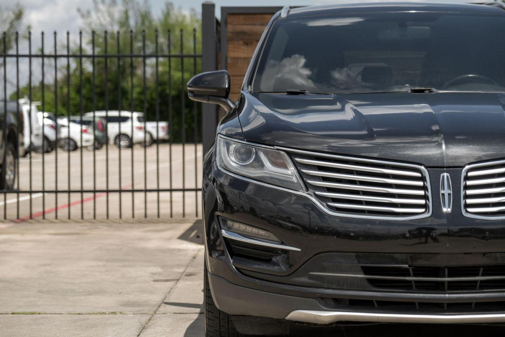 2015 black Lincoln MKC FWD (5LMCJ1A9XFU) with an 2.0L L4 DOHC 16V engine, 6-Speed Automatic transmission, located at 2401 E Main St., Grand Prairie, TX, 75050, (972) 262-4440, 32.748981, -96.969643 - Photo#43