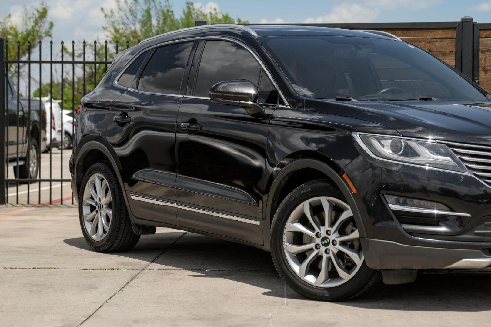 2015 black Lincoln MKC FWD (5LMCJ1A9XFU) with an 2.0L L4 DOHC 16V engine, 6-Speed Automatic transmission, located at 2401 E Main St., Grand Prairie, TX, 75050, (972) 262-4440, 32.748981, -96.969643 - Photo#5