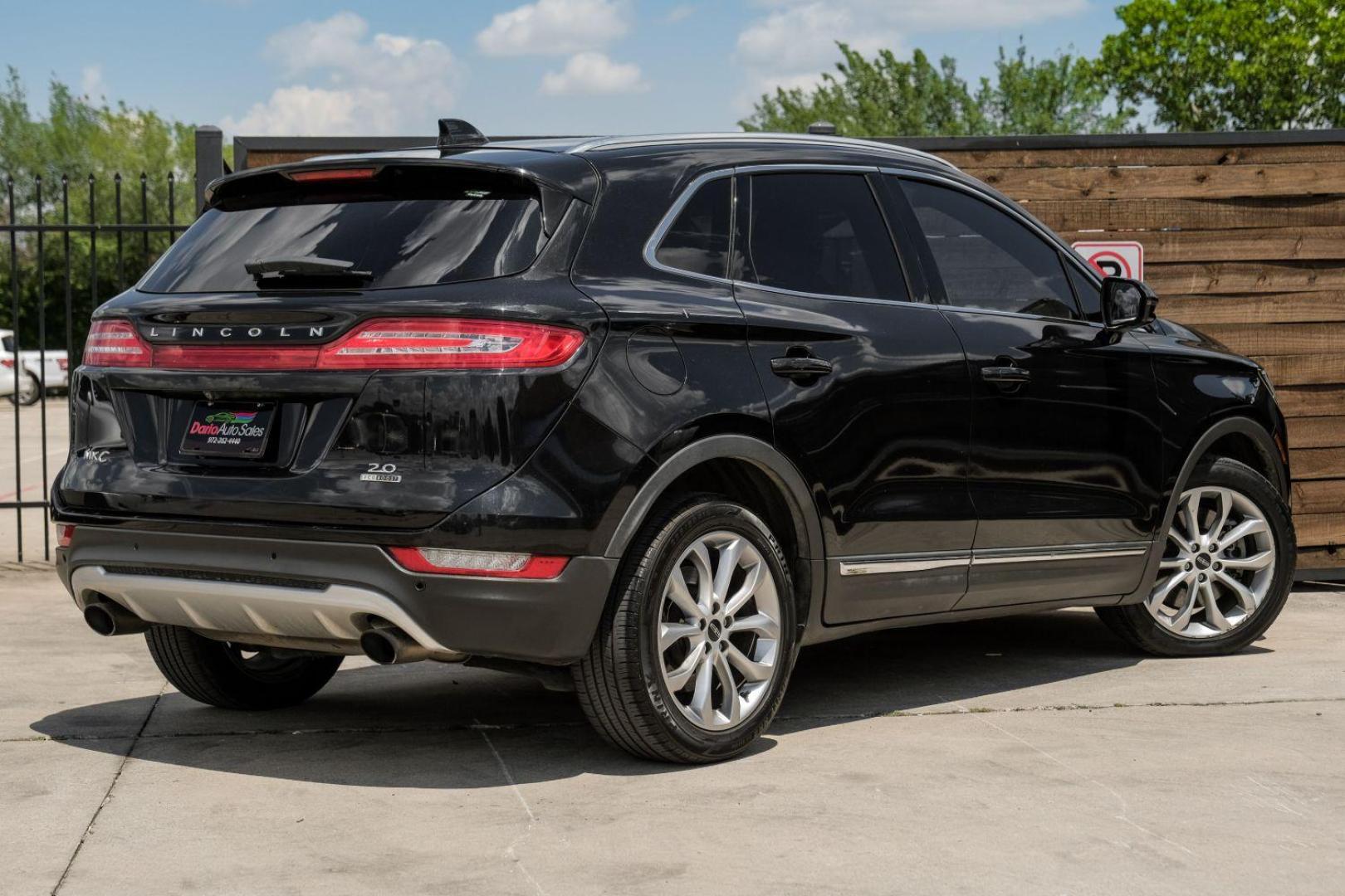 2015 black Lincoln MKC FWD (5LMCJ1A9XFU) with an 2.0L L4 DOHC 16V engine, 6-Speed Automatic transmission, located at 2401 E Main St., Grand Prairie, TX, 75050, (972) 262-4440, 32.748981, -96.969643 - Photo#8