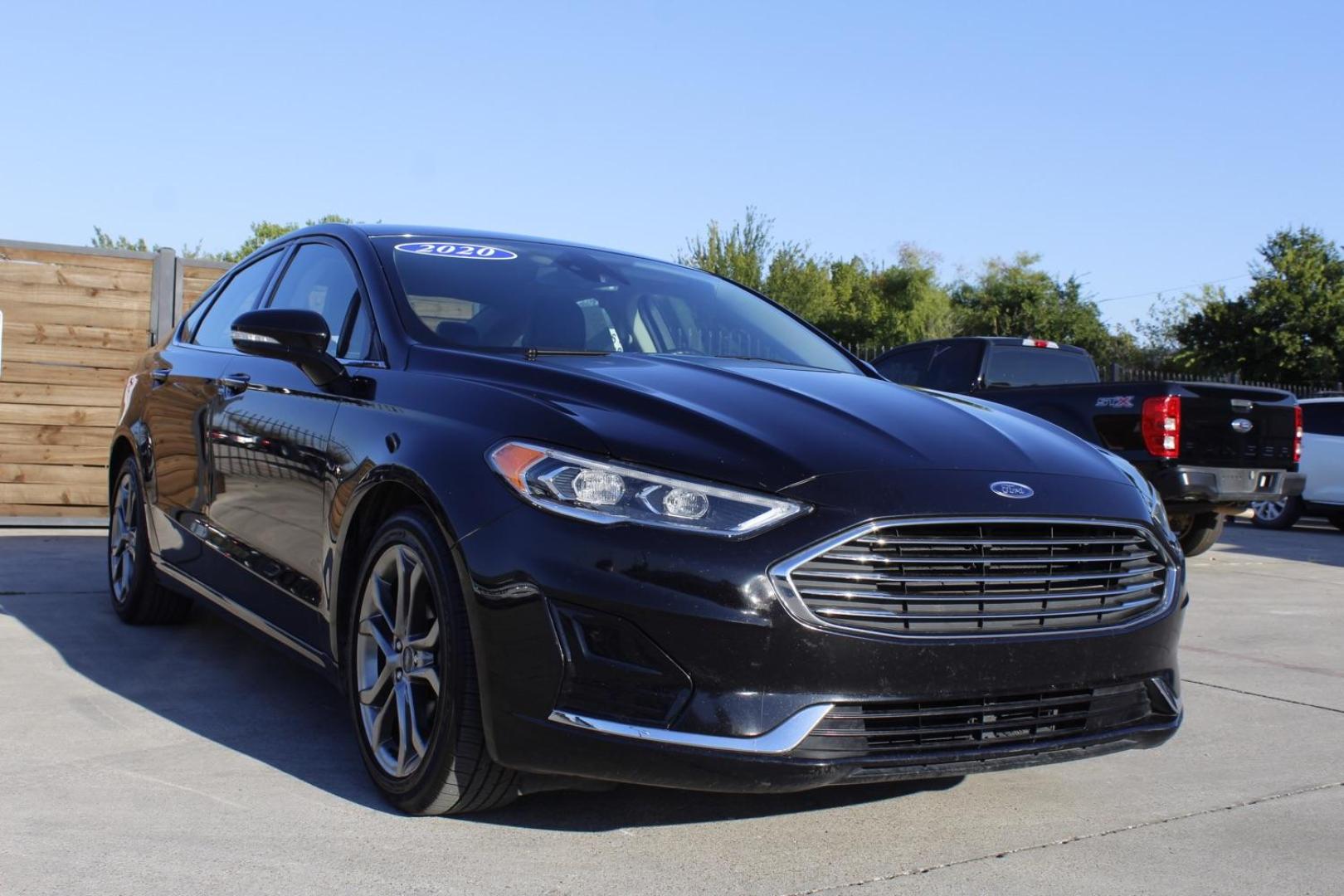 2020 black Ford Fusion SEL (3FA6P0CD4LR) with an 1.5L L4 DOHC 16V engine, 6-Speed Automatic transmission, located at 2401 E Main St., Grand Prairie, TX, 75050, (972) 262-4440, 32.748981, -96.969643 - Photo#1