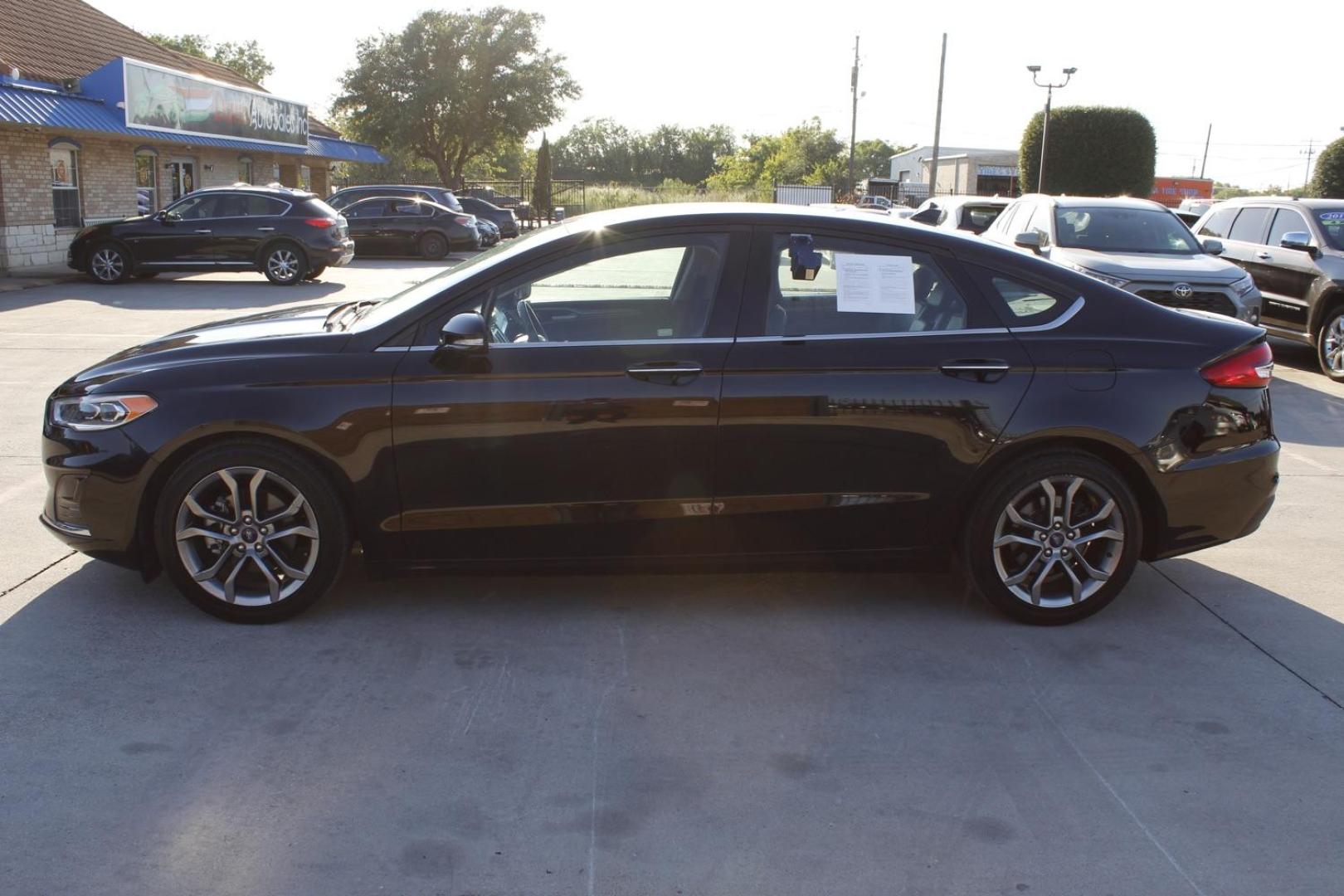 2020 black Ford Fusion SEL (3FA6P0CD4LR) with an 1.5L L4 DOHC 16V engine, 6-Speed Automatic transmission, located at 2401 E Main St., Grand Prairie, TX, 75050, (972) 262-4440, 32.748981, -96.969643 - Photo#3