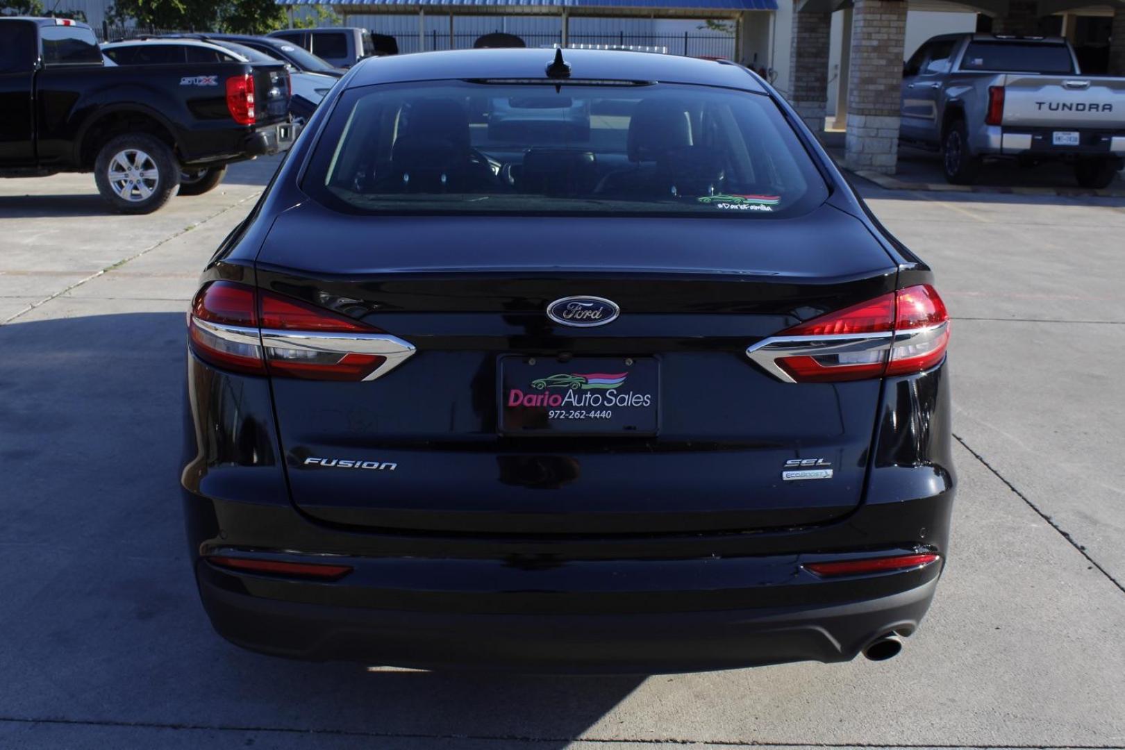 2020 black Ford Fusion SEL (3FA6P0CD4LR) with an 1.5L L4 DOHC 16V engine, 6-Speed Automatic transmission, located at 2401 E Main St., Grand Prairie, TX, 75050, (972) 262-4440, 32.748981, -96.969643 - Photo#4