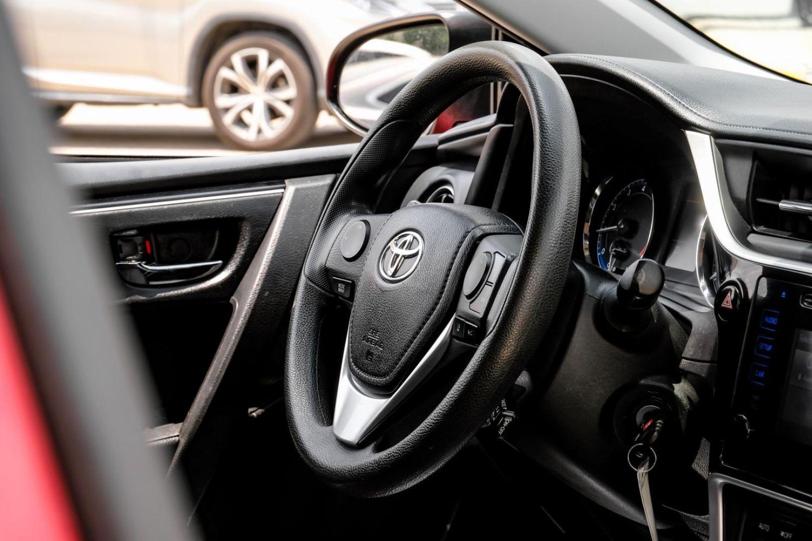 2018 red Toyota Corolla LE CVT (5YFBURHE8JP) with an 1.8L L4 DOHC 16V engine, Continuously Variable Transmission transmission, located at 2401 E Main St., Grand Prairie, TX, 75050, (972) 262-4440, 32.748981, -96.969643 - Photo#17