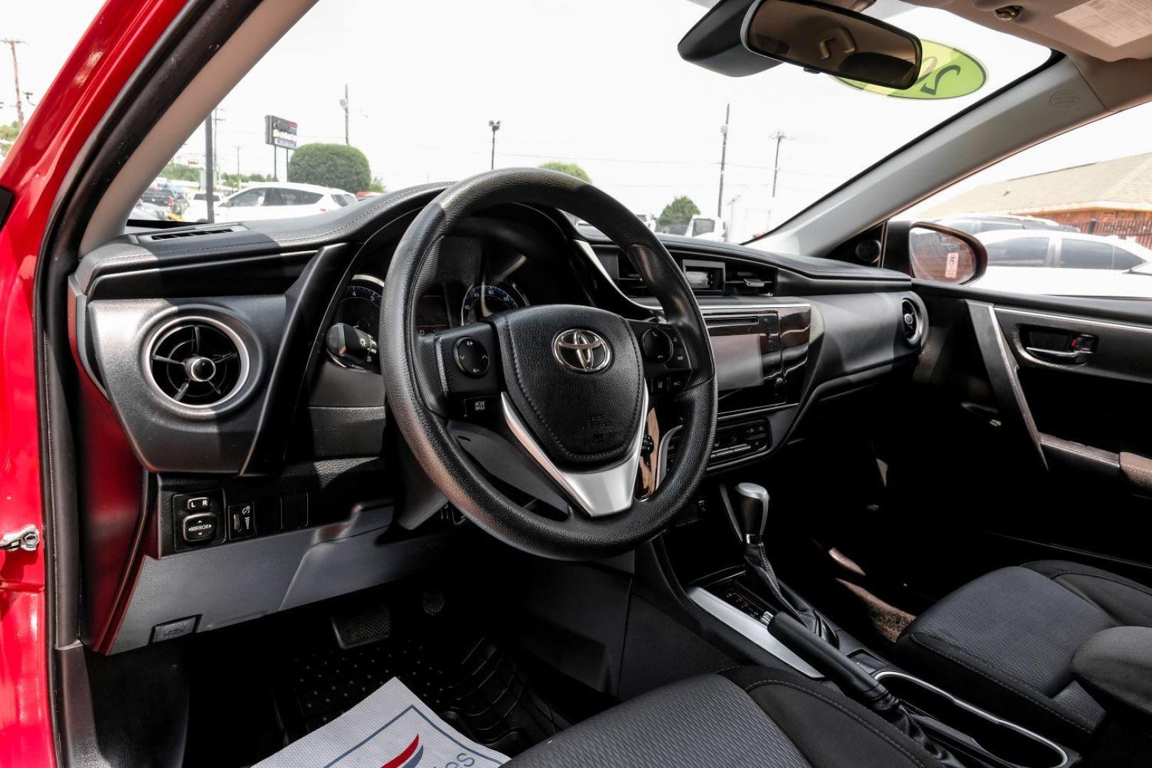 2018 red Toyota Corolla LE CVT (5YFBURHE8JP) with an 1.8L L4 DOHC 16V engine, Continuously Variable Transmission transmission, located at 2401 E Main St., Grand Prairie, TX, 75050, (972) 262-4440, 32.748981, -96.969643 - Photo#2