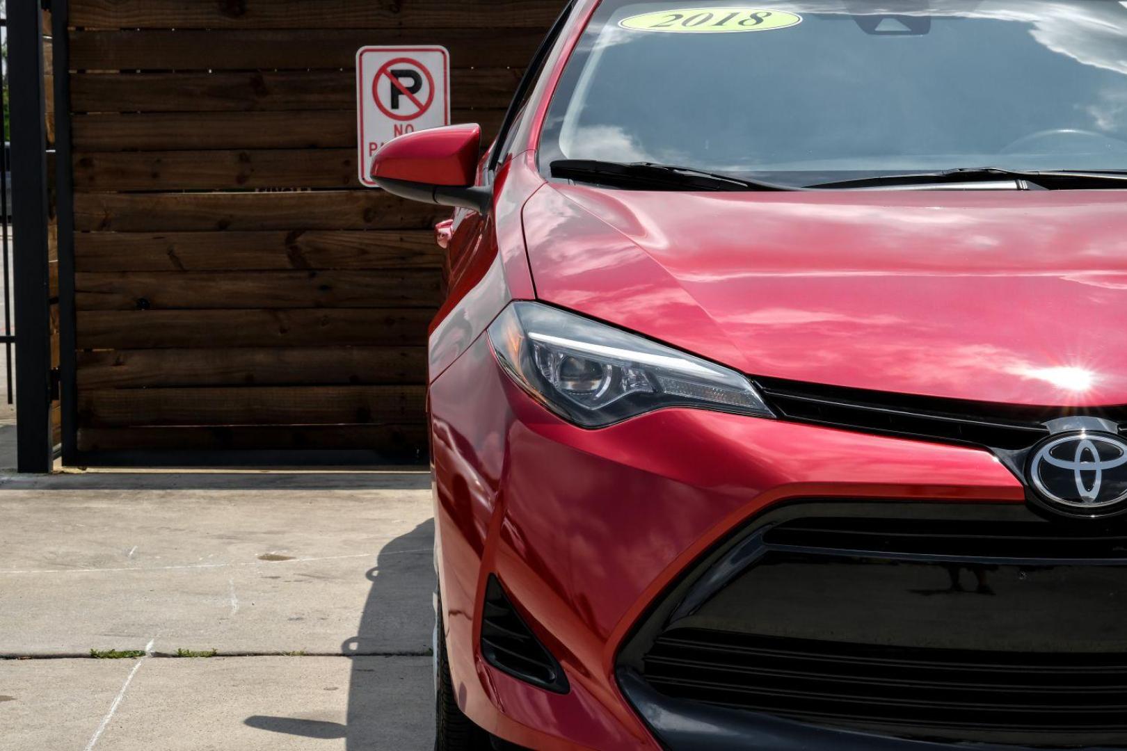 2018 red Toyota Corolla LE CVT (5YFBURHE8JP) with an 1.8L L4 DOHC 16V engine, Continuously Variable Transmission transmission, located at 2401 E Main St., Grand Prairie, TX, 75050, (972) 262-4440, 32.748981, -96.969643 - Photo#40