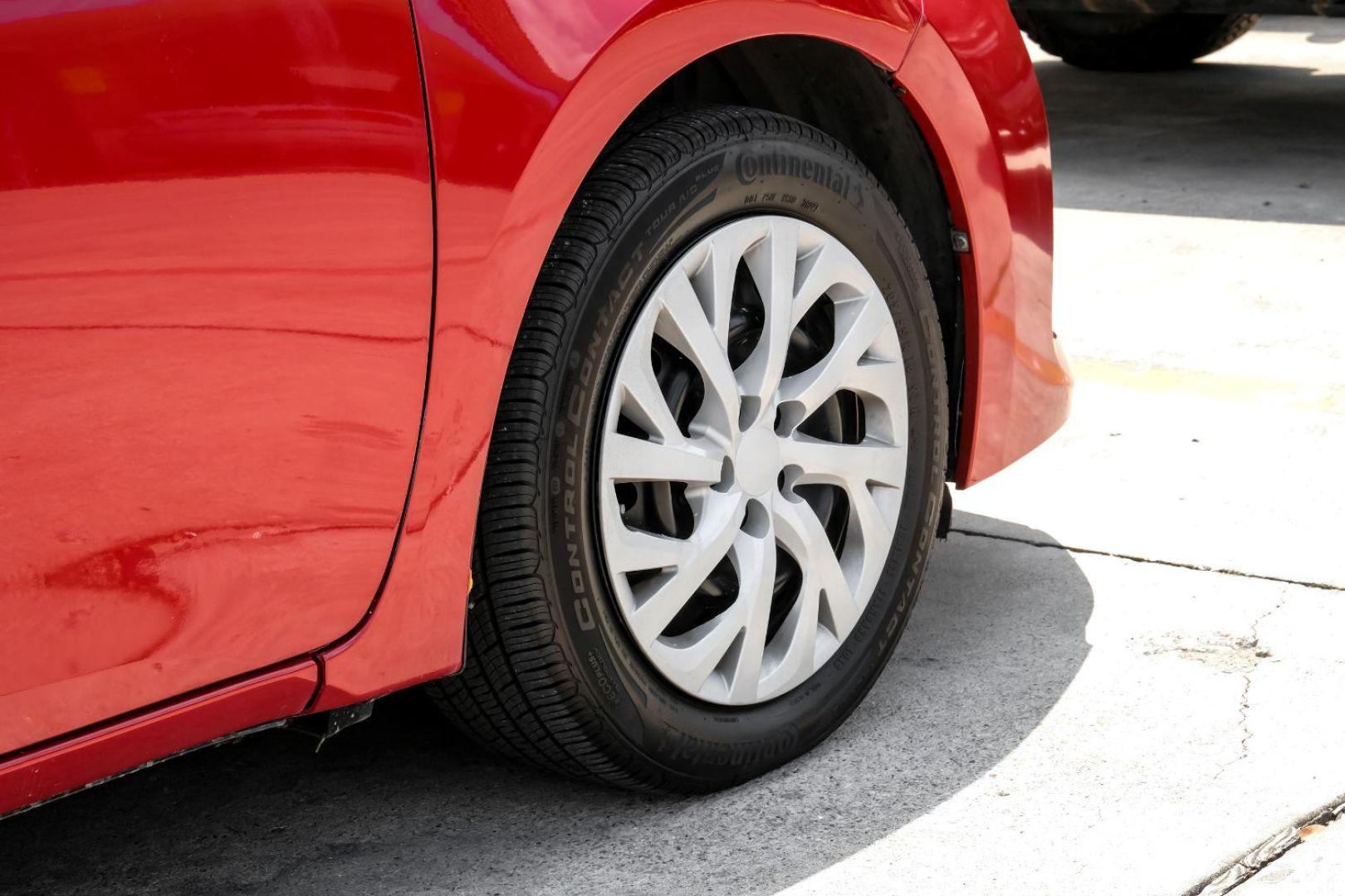 2018 red Toyota Corolla LE CVT (5YFBURHE8JP) with an 1.8L L4 DOHC 16V engine, Continuously Variable Transmission transmission, located at 2401 E Main St., Grand Prairie, TX, 75050, (972) 262-4440, 32.748981, -96.969643 - Photo#46