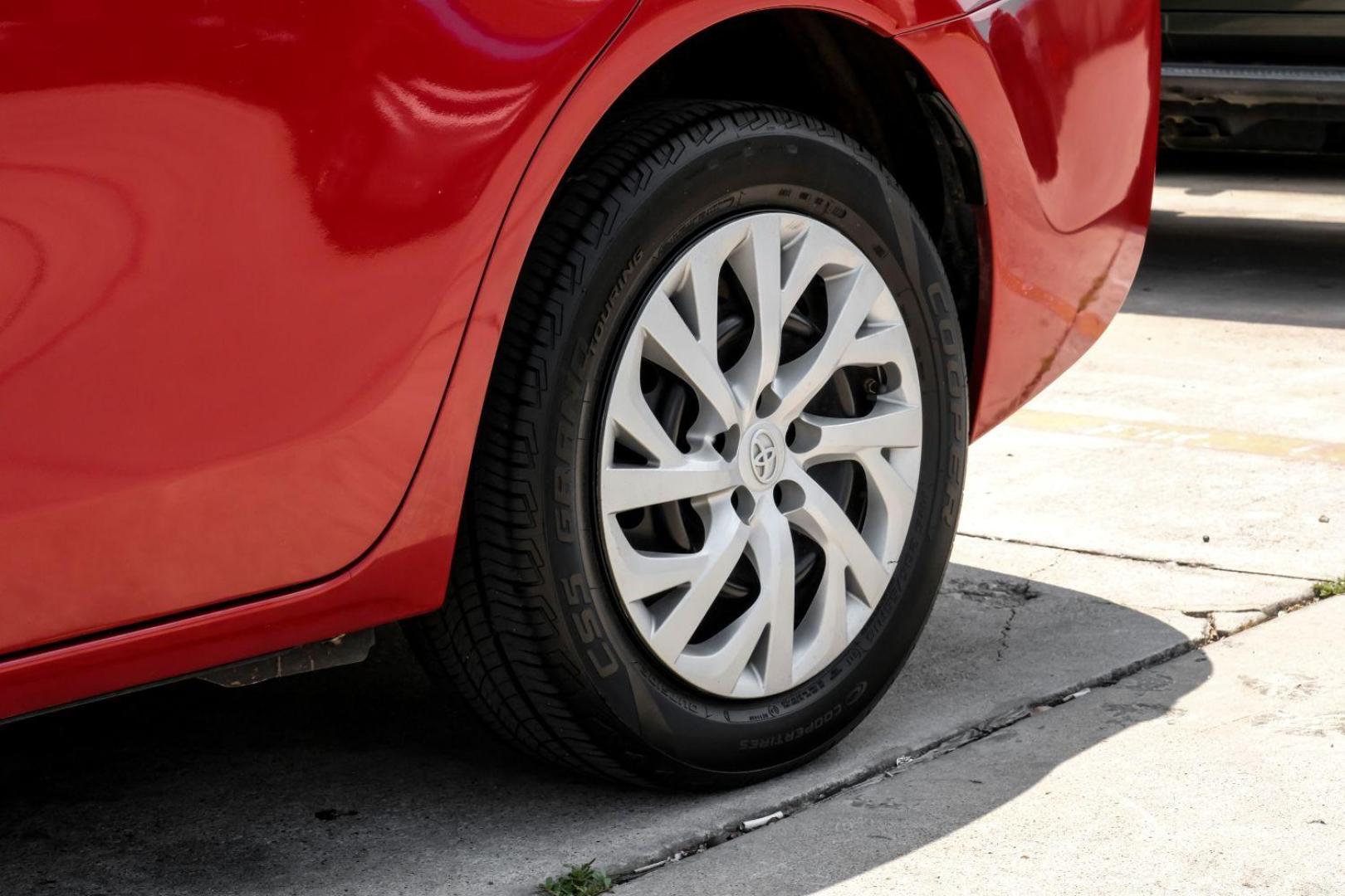 2018 red Toyota Corolla LE CVT (5YFBURHE8JP) with an 1.8L L4 DOHC 16V engine, Continuously Variable Transmission transmission, located at 2401 E Main St., Grand Prairie, TX, 75050, (972) 262-4440, 32.748981, -96.969643 - Photo#48