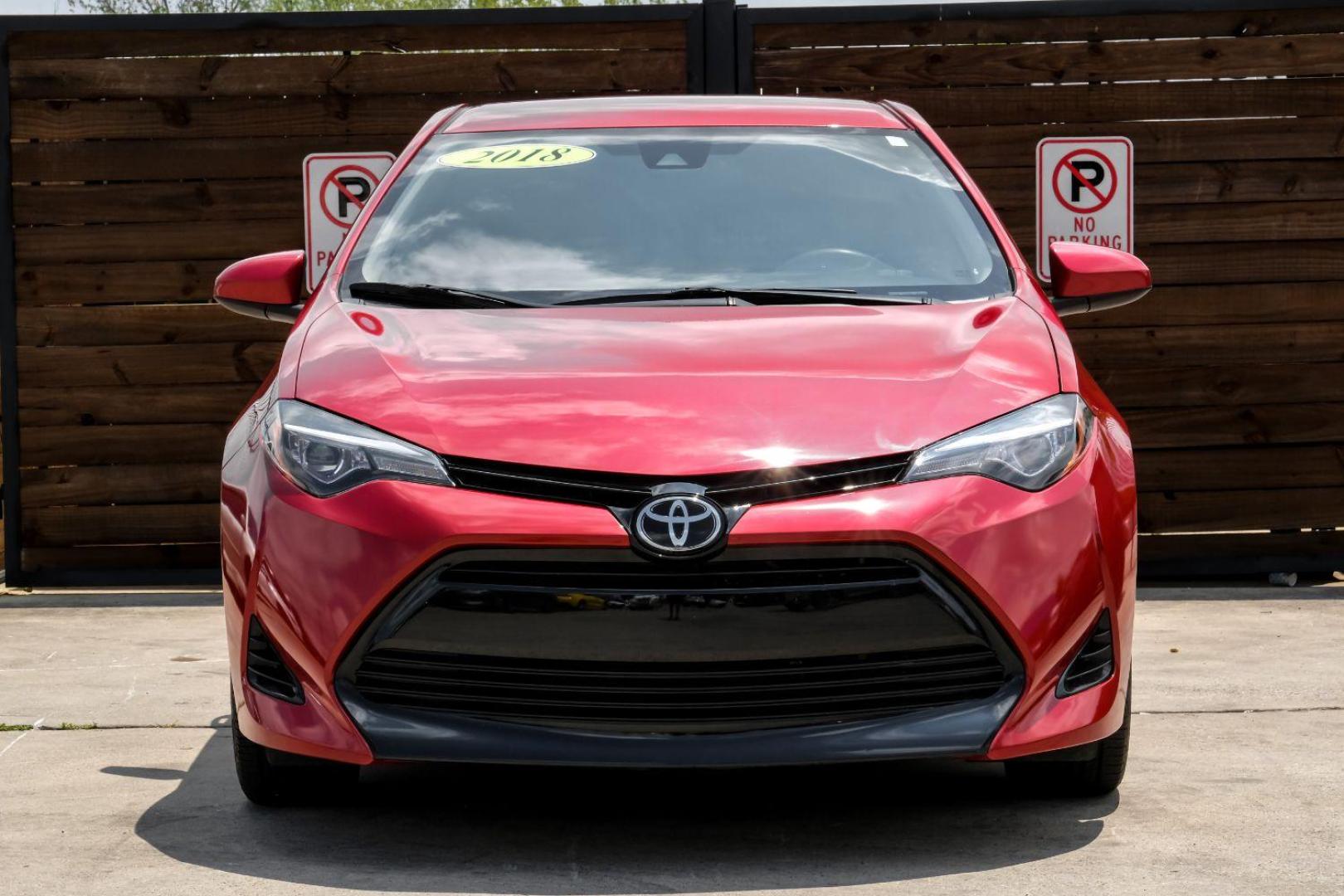 2018 red Toyota Corolla LE CVT (5YFBURHE8JP) with an 1.8L L4 DOHC 16V engine, Continuously Variable Transmission transmission, located at 2401 E Main St., Grand Prairie, TX, 75050, (972) 262-4440, 32.748981, -96.969643 - Photo#6