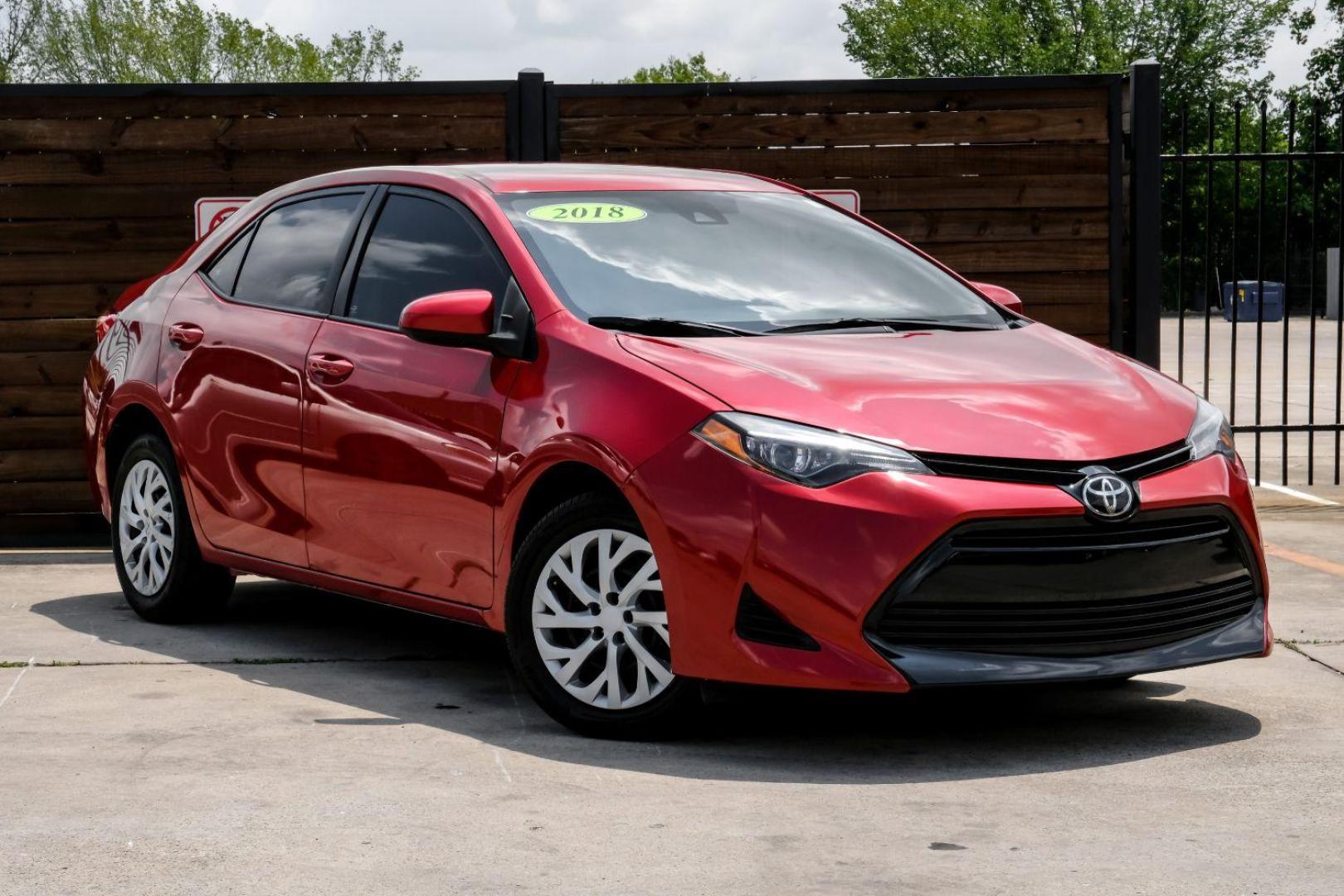 2018 red Toyota Corolla LE CVT (5YFBURHE8JP) with an 1.8L L4 DOHC 16V engine, Continuously Variable Transmission transmission, located at 2401 E Main St., Grand Prairie, TX, 75050, (972) 262-4440, 32.748981, -96.969643 - Photo#7