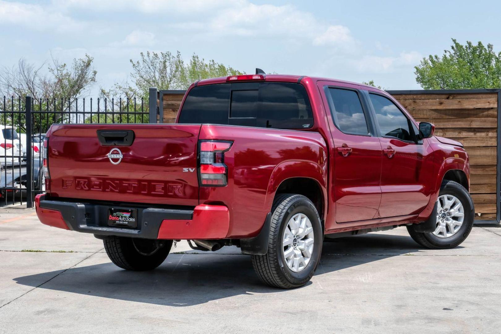 2023 red Nissan Frontier SV Crew Cab 2WD (1N6ED1EJ0PN) with an 3.8L V6 DOHC 24V engine, 9-Speed Automatic transmission, located at 2401 E Main St., Grand Prairie, TX, 75050, (972) 262-4440, 32.748981, -96.969643 - Photo#9