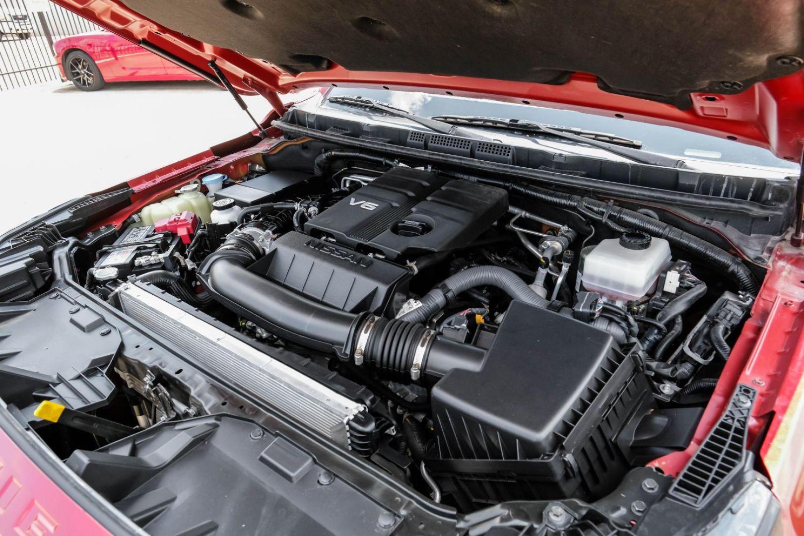 2023 red Nissan Frontier SV Crew Cab 2WD (1N6ED1EJ0PN) with an 3.8L V6 DOHC 24V engine, 9-Speed Automatic transmission, located at 2401 E Main St., Grand Prairie, TX, 75050, (972) 262-4440, 32.748981, -96.969643 - Photo#49