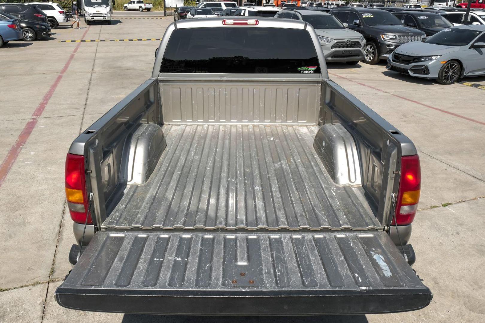 2001 GOLD Chevrolet Silverado 1500 LT Ext. Cab Long Bed 2WD with OnStar (2GCEC19T511) with an 5.3L V8 OHV 16V engine, 4-Speed Automatic transmission, located at 2401 E Main St., Grand Prairie, TX, 75050, (972) 262-4440, 32.748981, -96.969643 - Photo#49