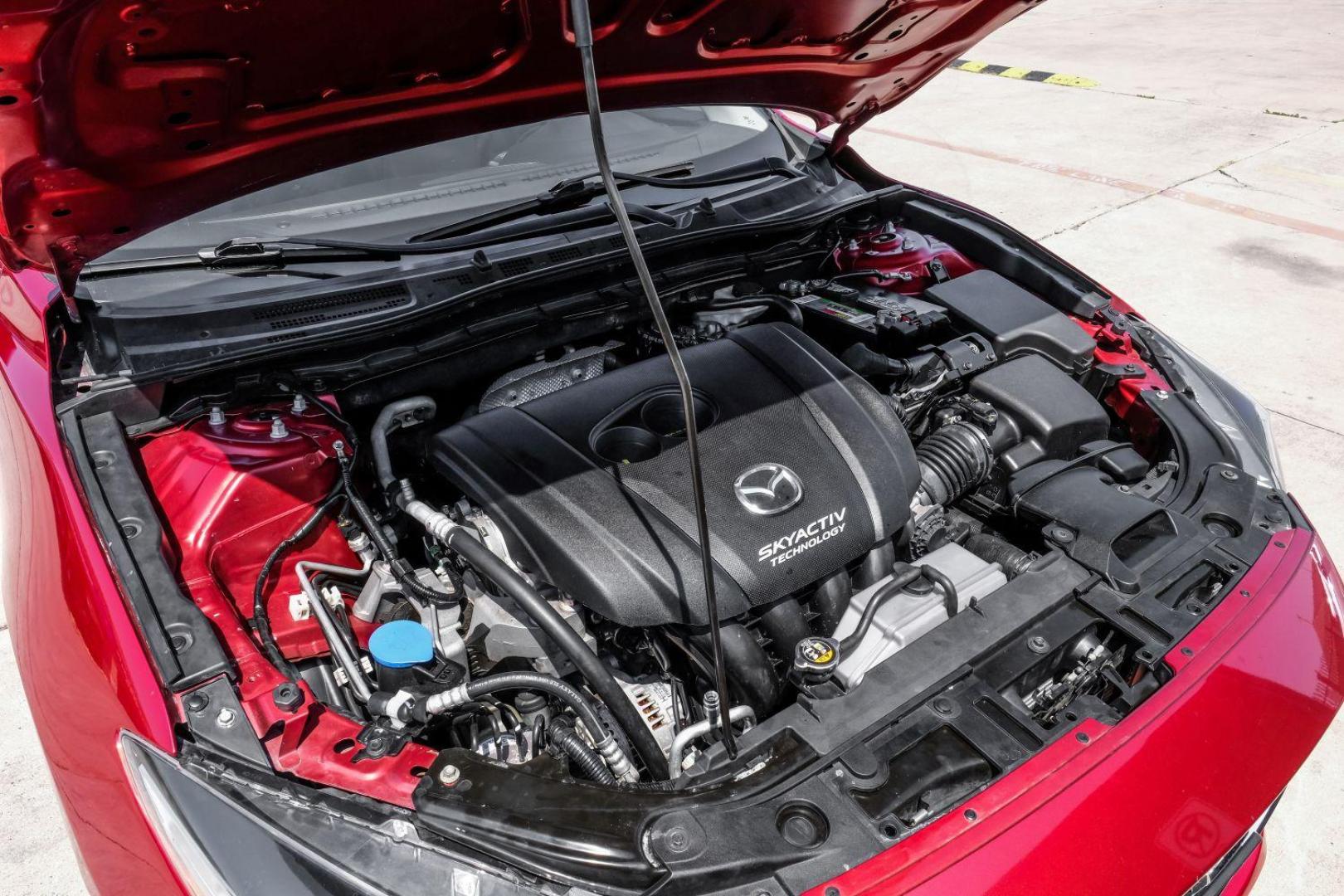 2018 red Mazda MAZDA3 s Touring AT 4-Door (3MZBN1V39JM) with an 2.5L L4 DOHC 16V engine, 6-Speed Automatic transmission, located at 2401 E Main St., Grand Prairie, TX, 75050, (972) 262-4440, 32.748981, -96.969643 - Photo#48