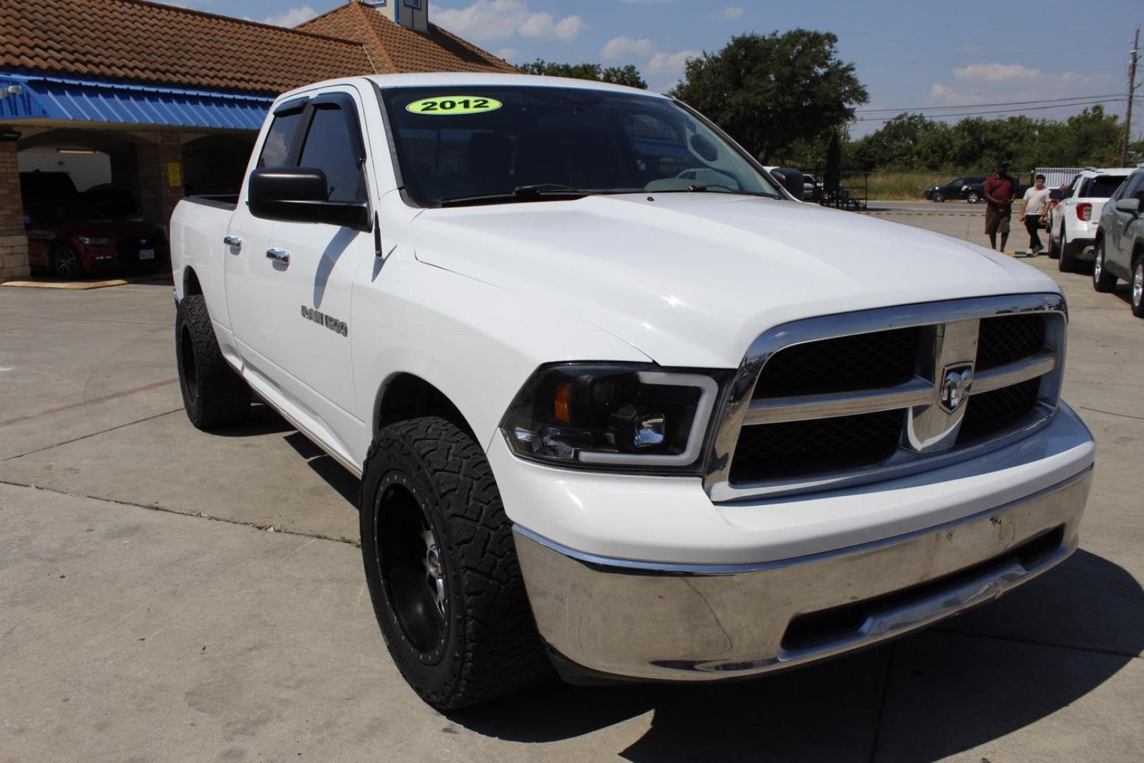 2012 White RAM 1500 SLT Quad Cab 2WD (1C6RD6GP2CS) with an 4.7L V8 SOHC 16V engine, 6-Speed Automatic transmission, located at 2401 E Main St., Grand Prairie, TX, 75050, (972) 262-4440, 32.748981, -96.969643 - Photo#0