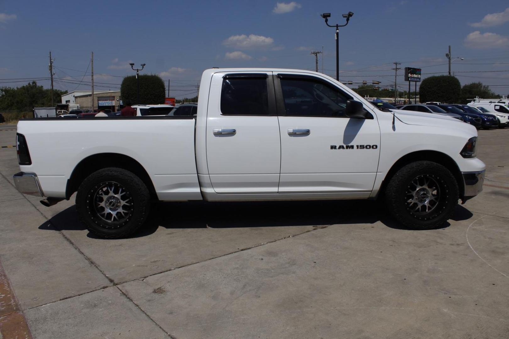 2012 White RAM 1500 SLT Quad Cab 2WD (1C6RD6GP2CS) with an 4.7L V8 SOHC 16V engine, 6-Speed Automatic transmission, located at 2401 E Main St., Grand Prairie, TX, 75050, (972) 262-4440, 32.748981, -96.969643 - Photo#2