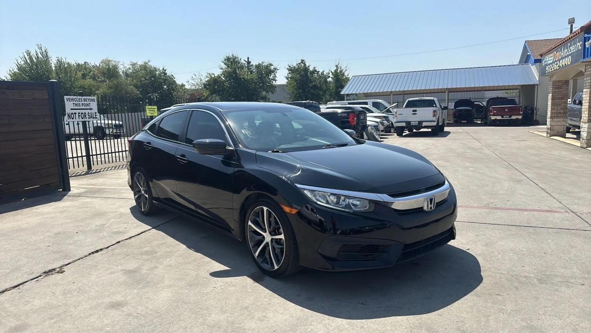 2017 BLACK Honda Civic LX Sedan CVT (19XFC2F51HE) with an 2.0L L4 DOHC 16V engine, Continuously Variable Transmission transmission, located at 2401 E Main St., Grand Prairie, TX, 75050, (972) 262-4440, 32.748981, -96.969643 - Photo#1