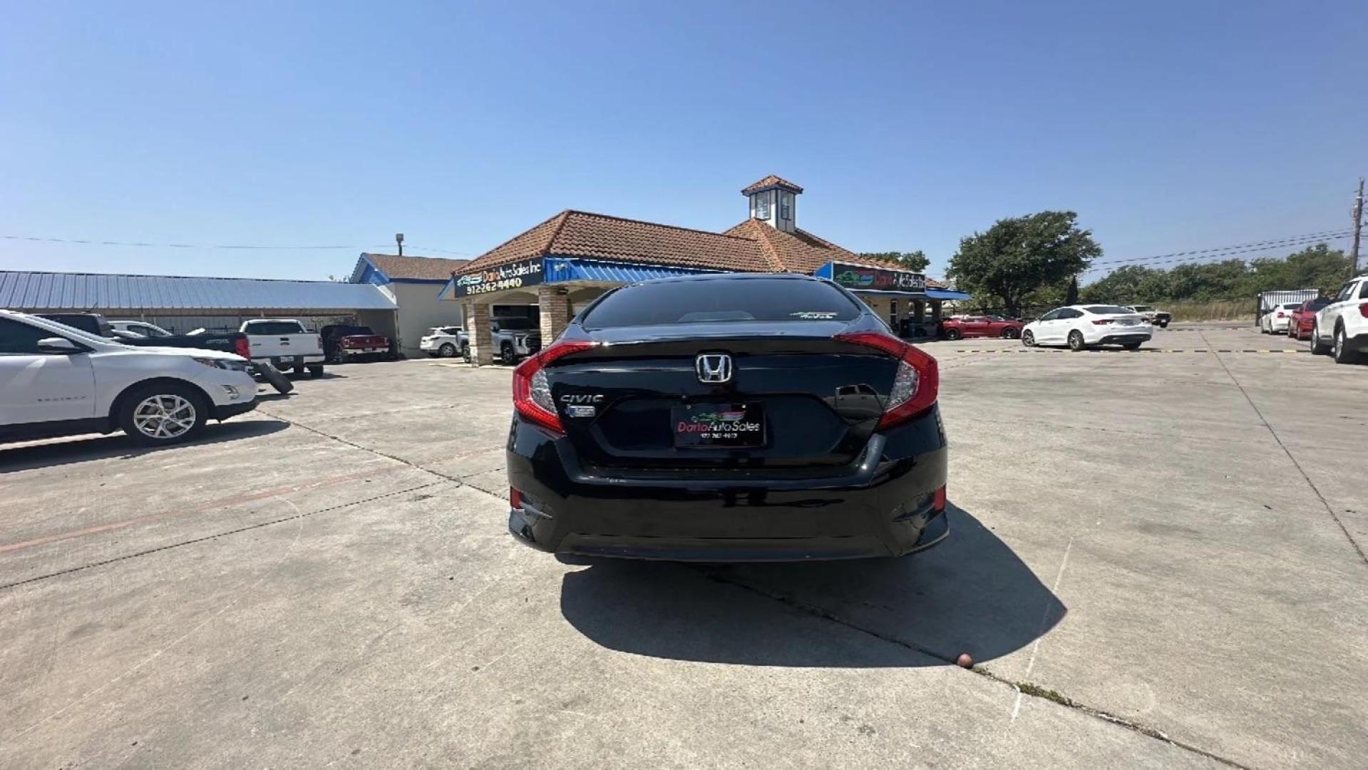 2017 BLACK Honda Civic LX Sedan CVT (19XFC2F51HE) with an 2.0L L4 DOHC 16V engine, Continuously Variable Transmission transmission, located at 2401 E Main St., Grand Prairie, TX, 75050, (972) 262-4440, 32.748981, -96.969643 - Photo#4