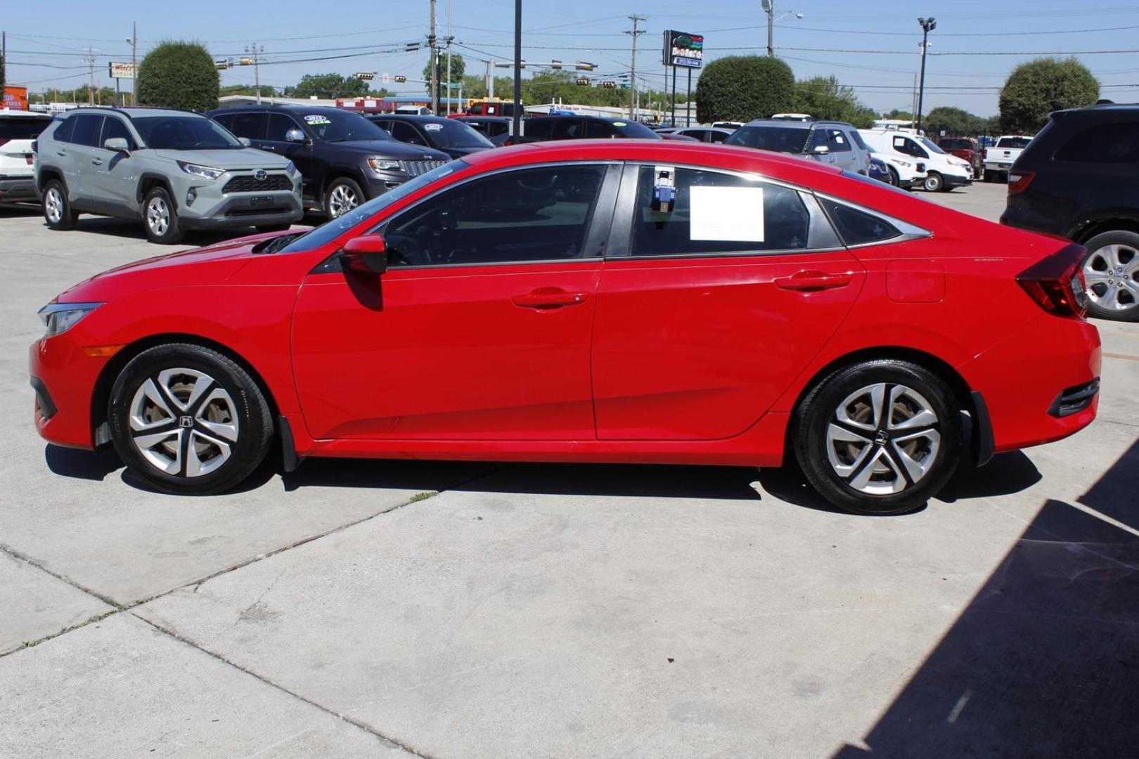 2016 RED Honda Civic LX Sedan CVT (2HGFC2F51GH) with an 2.0L L4 DOHC 16V engine, Continuously Variable Transmission transmission, located at 2401 E Main St., Grand Prairie, TX, 75050, (972) 262-4440, 32.748981, -96.969643 - Photo#2