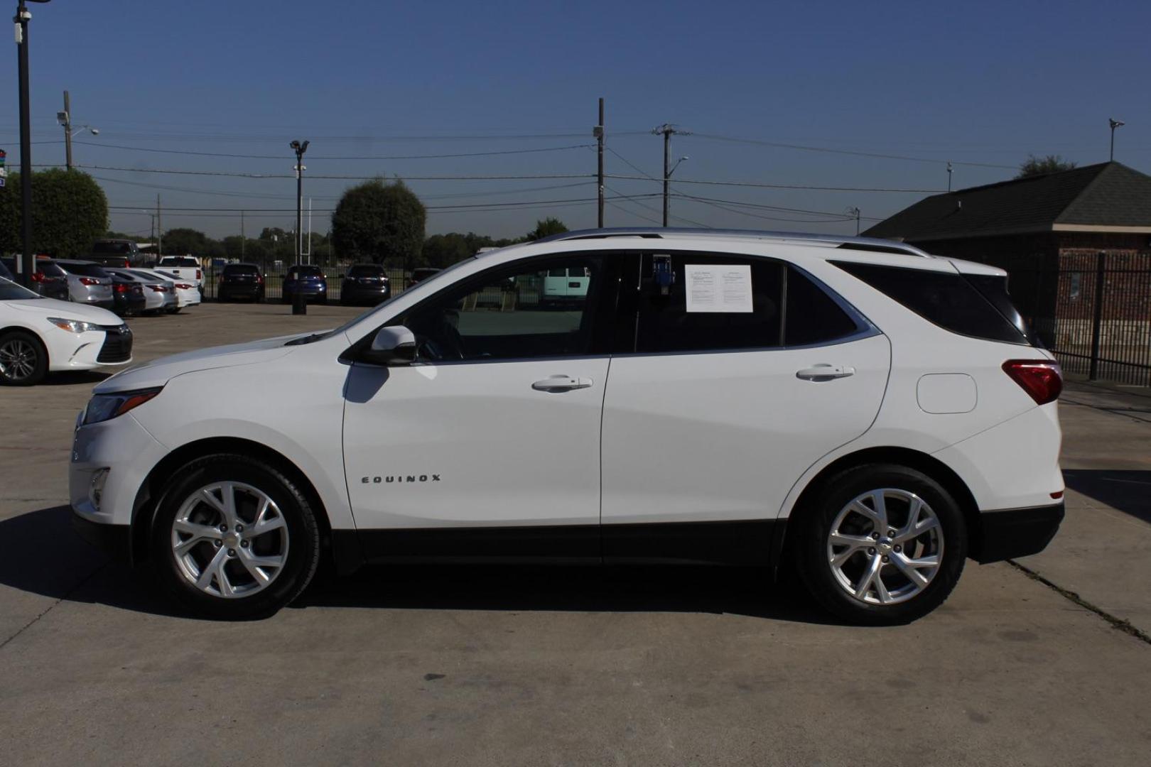 2018 White Chevrolet Equinox LT 2WD (3GNAXKEX0JS) with an 2.0L L4 DOHC 16V TURBO engine, 6-Speed Automatic transmission, located at 2401 E Main St., Grand Prairie, TX, 75050, (972) 262-4440, 32.748981, -96.969643 - Photo#2