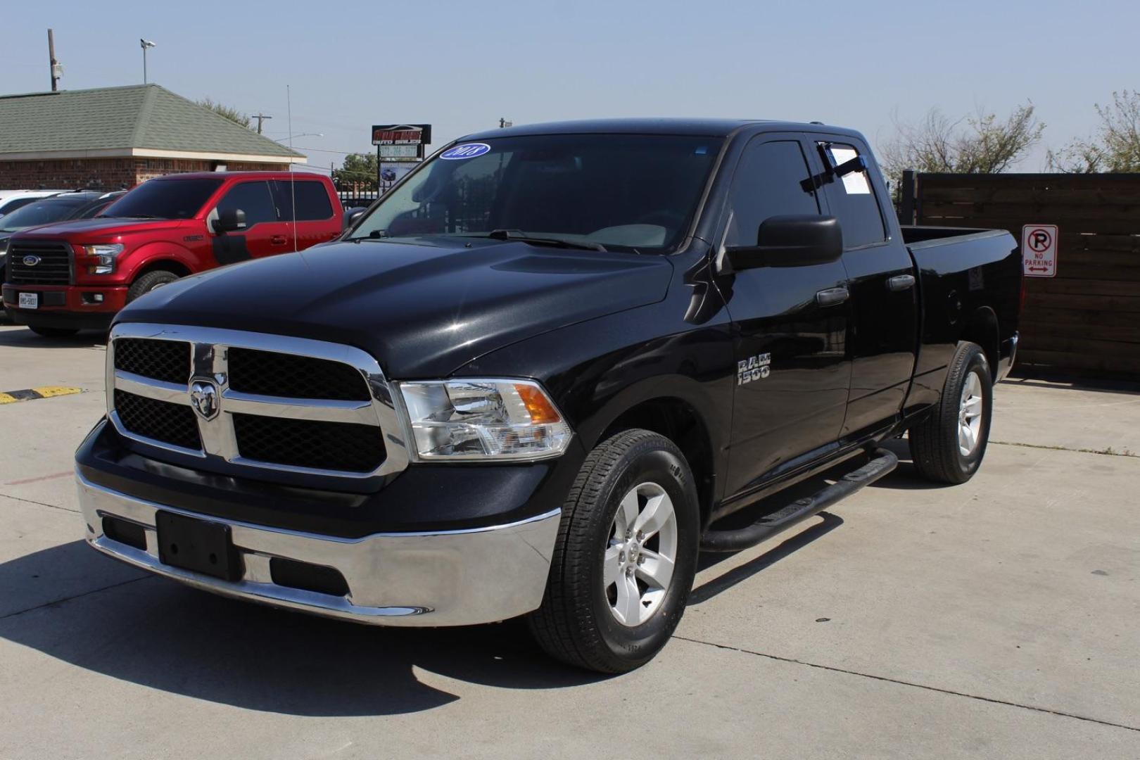 2018 black RAM 1500 Tradesman Quad Cab 2WD (1C6RR6FG7JS) with an 3.6L V6 DOHC 24V FFV engine, 8-Speed Automatic transmission, located at 2401 E Main St., Grand Prairie, TX, 75050, (972) 262-4440, 32.748981, -96.969643 - Photo#1