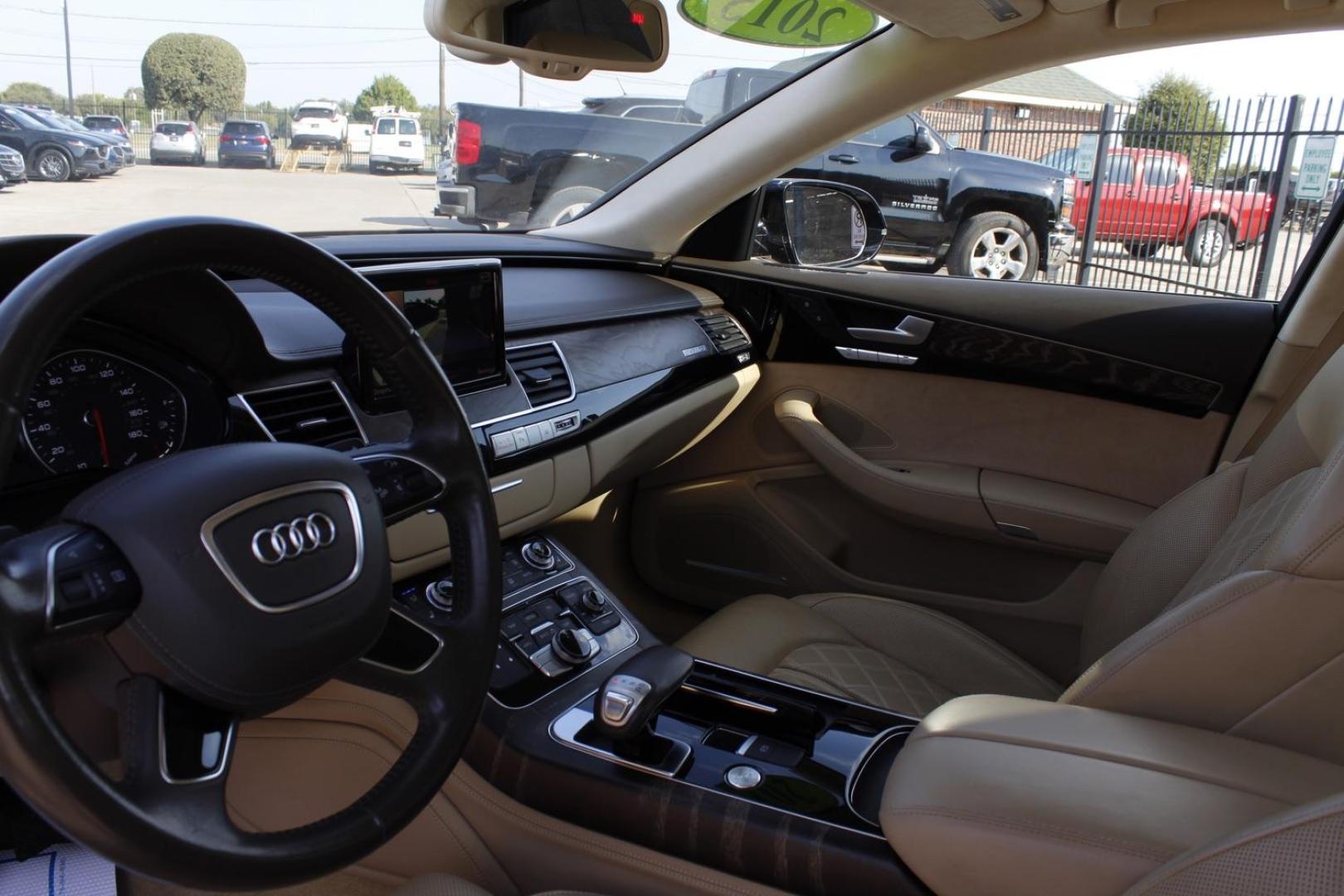 2015 Black Audi A8 L 4.0T quattro (WAU32AFD6FN) with an 4.0L V8 DOHC 32V engine, 8-Speed Automatic transmission, located at 2401 E Main St., Grand Prairie, TX, 75050, (972) 262-4440, 32.748981, -96.969643 - Photo#12