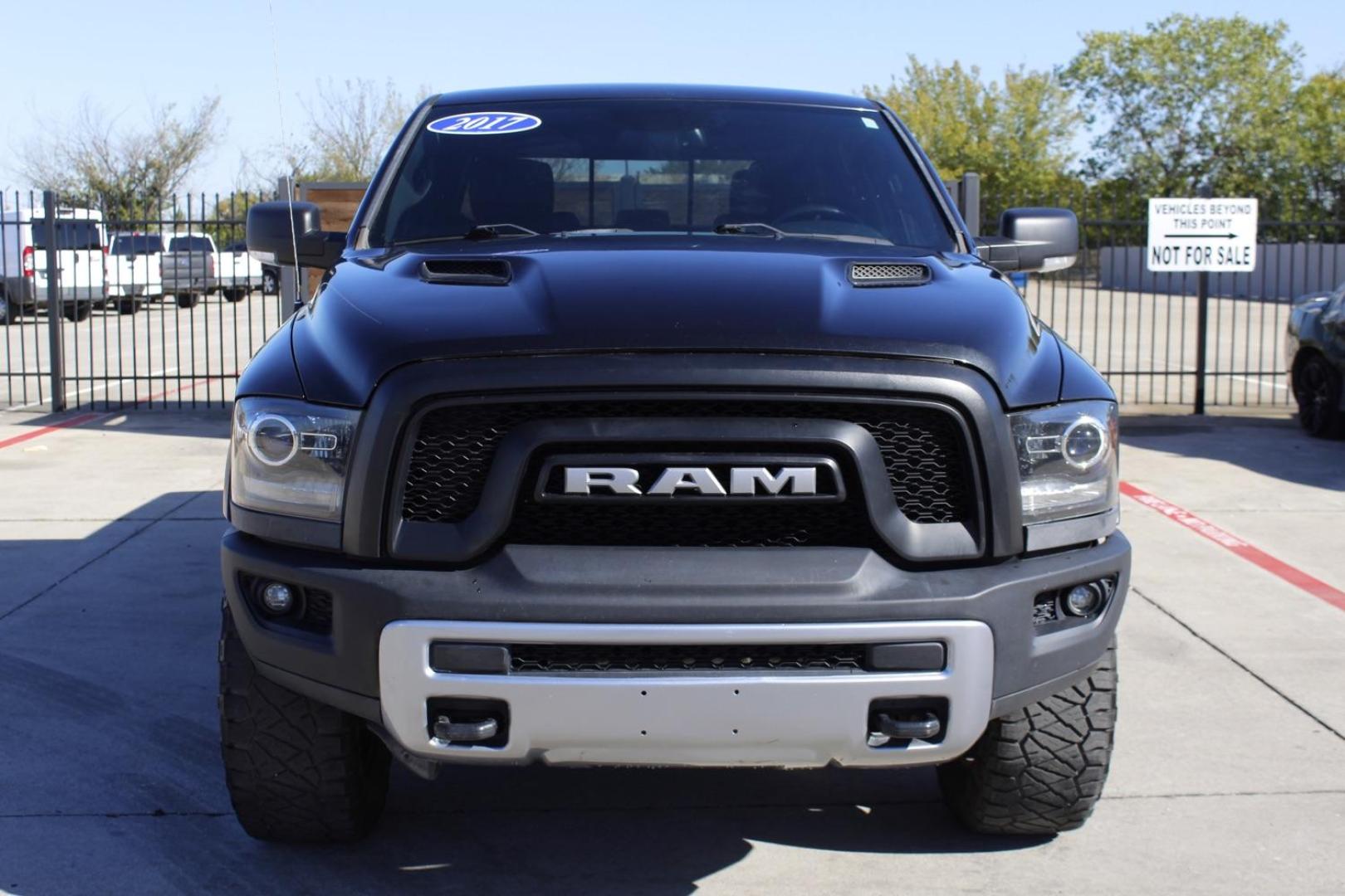 2017 black RAM 1500 Rebel Crew Cab SWB 4WD (1C6RR7YT0HS) with an 5.7L V8 OHV 16V engine, 8-Speed Automatic transmission, located at 2401 E Main St., Grand Prairie, TX, 75050, (972) 262-4440, 32.748981, -96.969643 - Photo#0