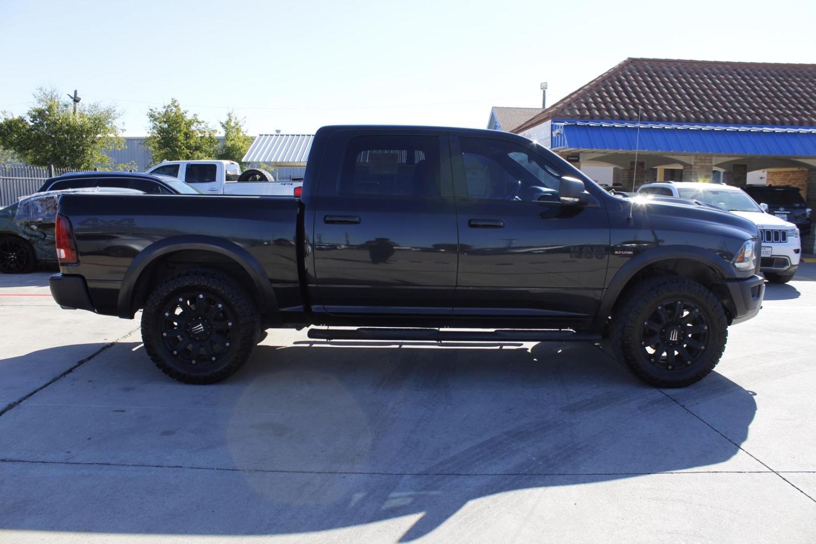 2017 black RAM 1500 Rebel Crew Cab SWB 4WD (1C6RR7YT0HS) with an 5.7L V8 OHV 16V engine, 8-Speed Automatic transmission, located at 2401 E Main St., Grand Prairie, TX, 75050, (972) 262-4440, 32.748981, -96.969643 - Photo#11