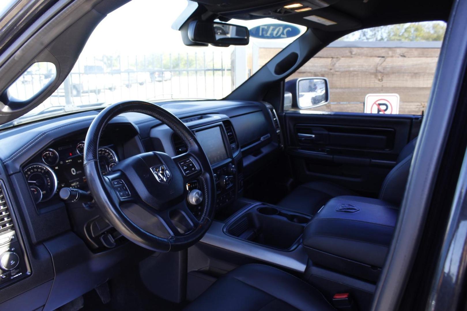 2017 black RAM 1500 Rebel Crew Cab SWB 4WD (1C6RR7YT0HS) with an 5.7L V8 OHV 16V engine, 8-Speed Automatic transmission, located at 2401 E Main St., Grand Prairie, TX, 75050, (972) 262-4440, 32.748981, -96.969643 - Photo#14