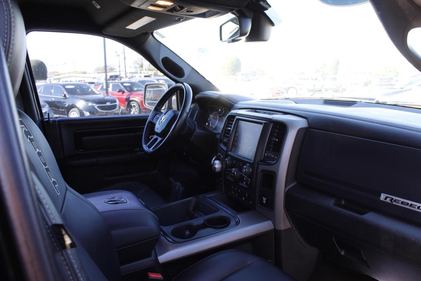 2017 black RAM 1500 Rebel Crew Cab SWB 4WD (1C6RR7YT0HS) with an 5.7L V8 OHV 16V engine, 8-Speed Automatic transmission, located at 2401 E Main St., Grand Prairie, TX, 75050, (972) 262-4440, 32.748981, -96.969643 - Photo#16