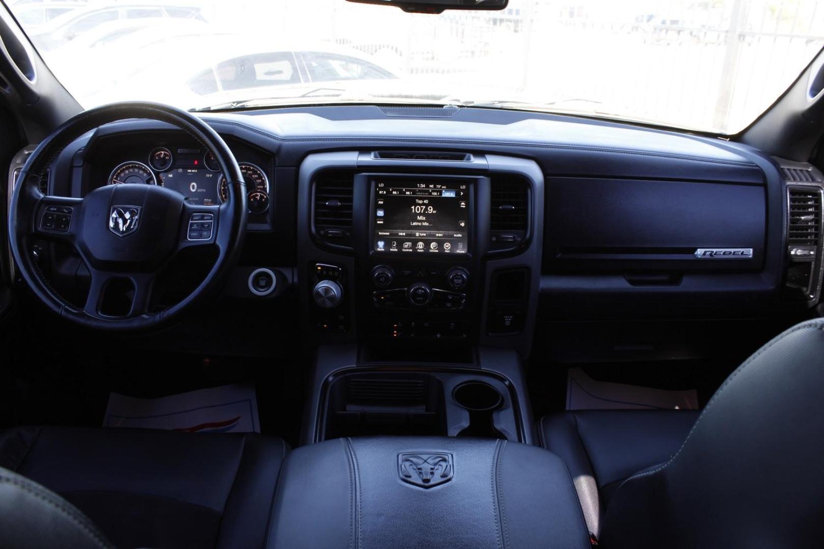 2017 black RAM 1500 Rebel Crew Cab SWB 4WD (1C6RR7YT0HS) with an 5.7L V8 OHV 16V engine, 8-Speed Automatic transmission, located at 2401 E Main St., Grand Prairie, TX, 75050, (972) 262-4440, 32.748981, -96.969643 - Photo#17