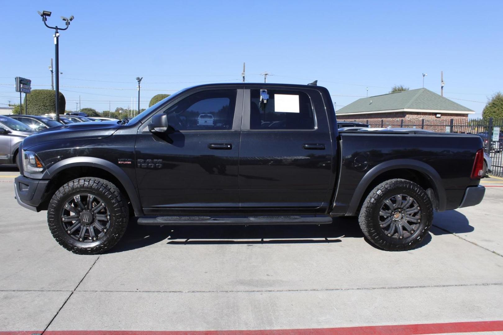 2017 black RAM 1500 Rebel Crew Cab SWB 4WD (1C6RR7YT0HS) with an 5.7L V8 OHV 16V engine, 8-Speed Automatic transmission, located at 2401 E Main St., Grand Prairie, TX, 75050, (972) 262-4440, 32.748981, -96.969643 - Photo#3