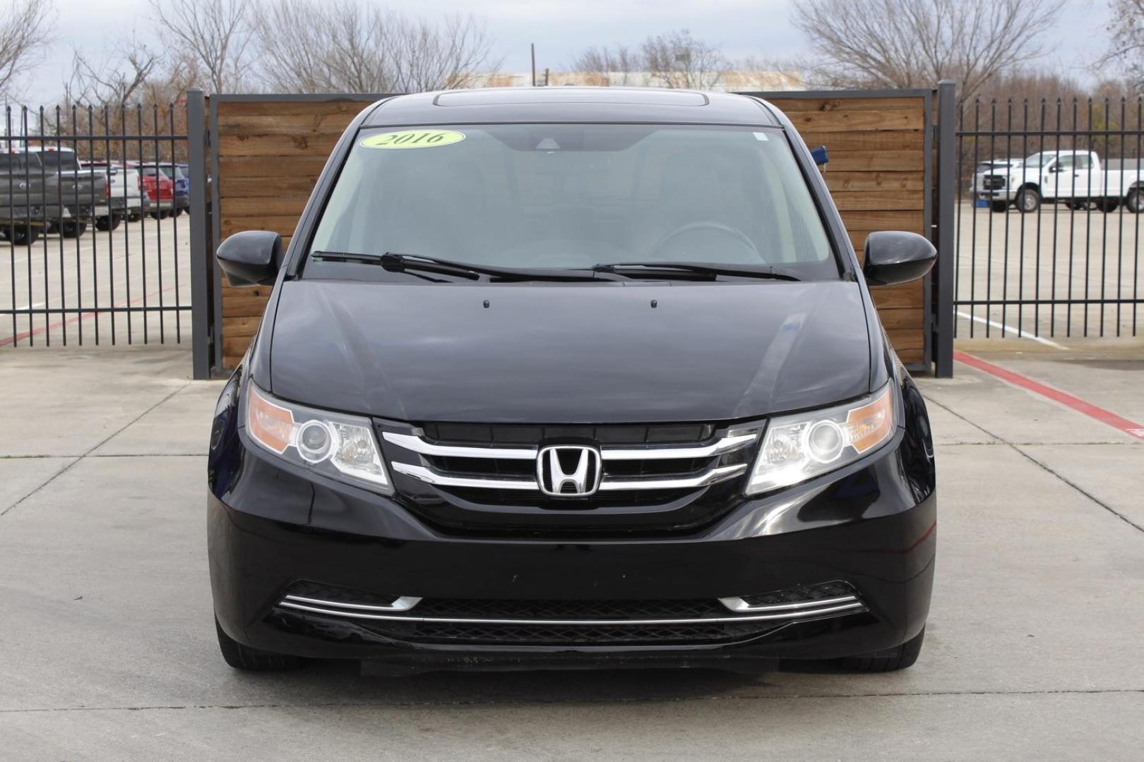 2016 BLACK Honda Odyssey EX-L (5FNRL5H65GB) with an 3.5L V6 SOHC 24V engine, 6-Speed Automatic transmission, located at 2401 E Main St., Grand Prairie, TX, 75050, (972) 262-4440, 32.748981, -96.969643 - Photo#0