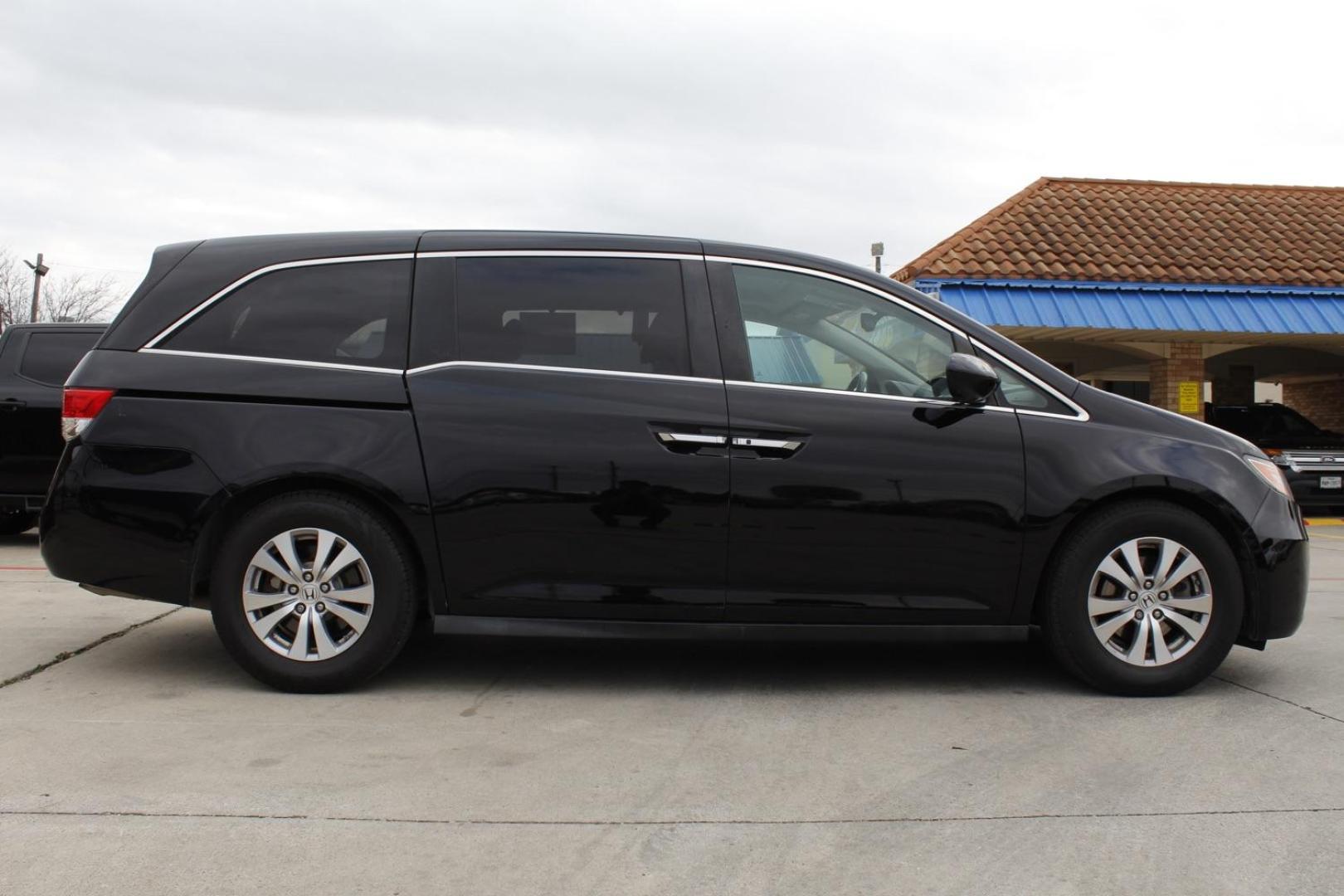 2016 BLACK Honda Odyssey EX-L (5FNRL5H65GB) with an 3.5L V6 SOHC 24V engine, 6-Speed Automatic transmission, located at 2401 E Main St., Grand Prairie, TX, 75050, (972) 262-4440, 32.748981, -96.969643 - Photo#7