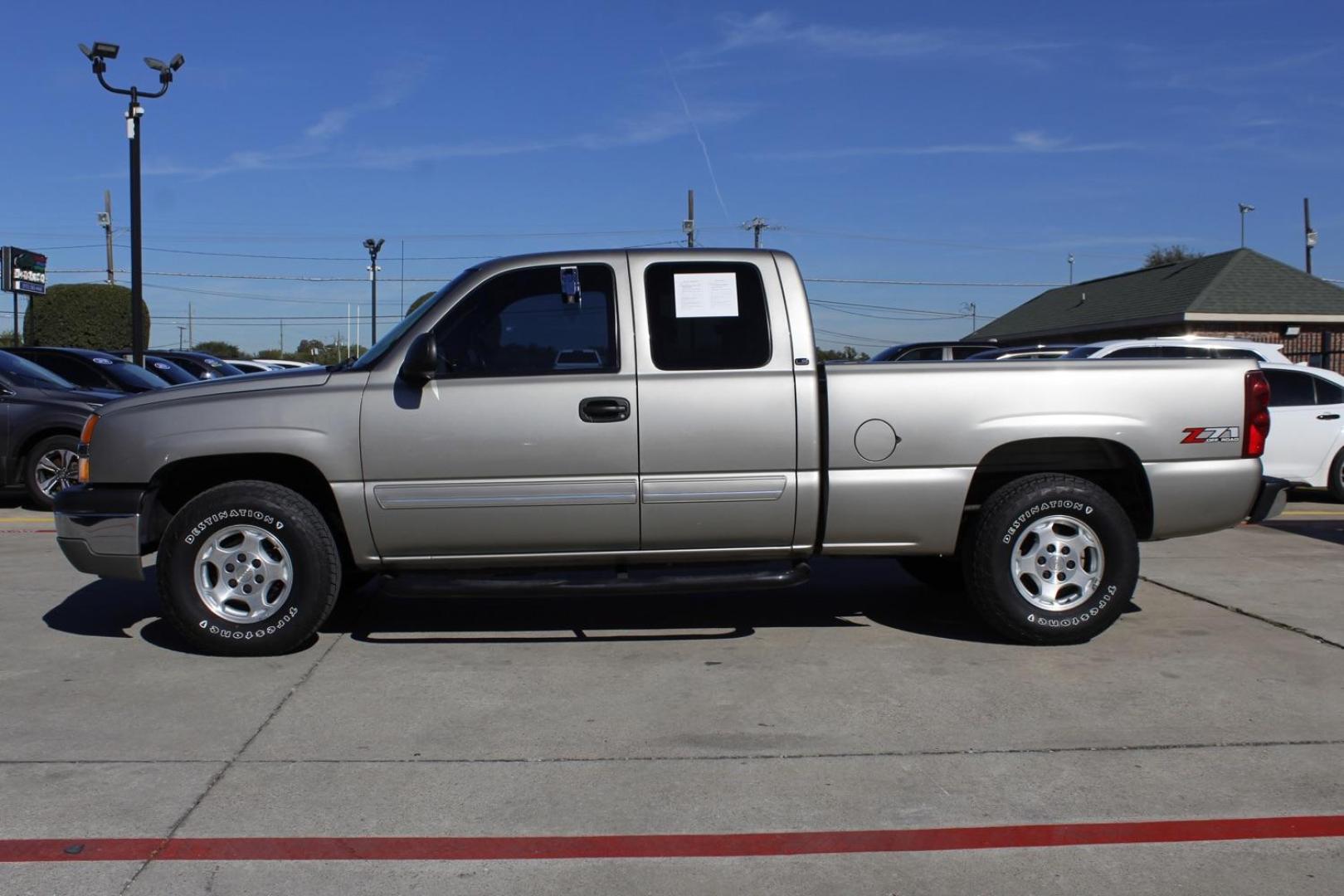 2003 GOLD Chevrolet Silverado 1500 Ext. Cab Short Bed 4WD (1GCEK19V03E) with an 4.8L V8 OHV 16V engine, 4-Speed Automatic transmission, located at 2401 E Main St., Grand Prairie, TX, 75050, (972) 262-4440, 32.748981, -96.969643 - Photo#2