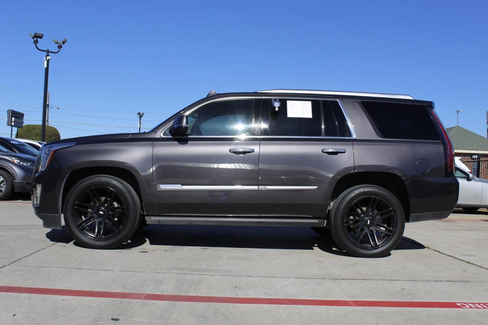 2016 gray Cadillac Escalade Premium 4WD (1GYS4CKJXGR) with an 6.2L V8 OHV 16V FFV engine, 6-Speed Automatic transmission, located at 2401 E Main St., Grand Prairie, TX, 75050, (972) 262-4440, 32.748981, -96.969643 - Photo#2