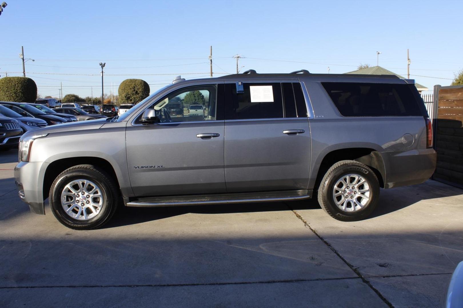 2019 Gray GMC Yukon XL SLT 2WD (1GKS1GKC4KR) with an 5.3L V8 OHV 16V engine, 6-Speed Automatic transmission, located at 2401 E Main St., Grand Prairie, TX, 75050, (972) 262-4440, 32.748981, -96.969643 - Photo#2