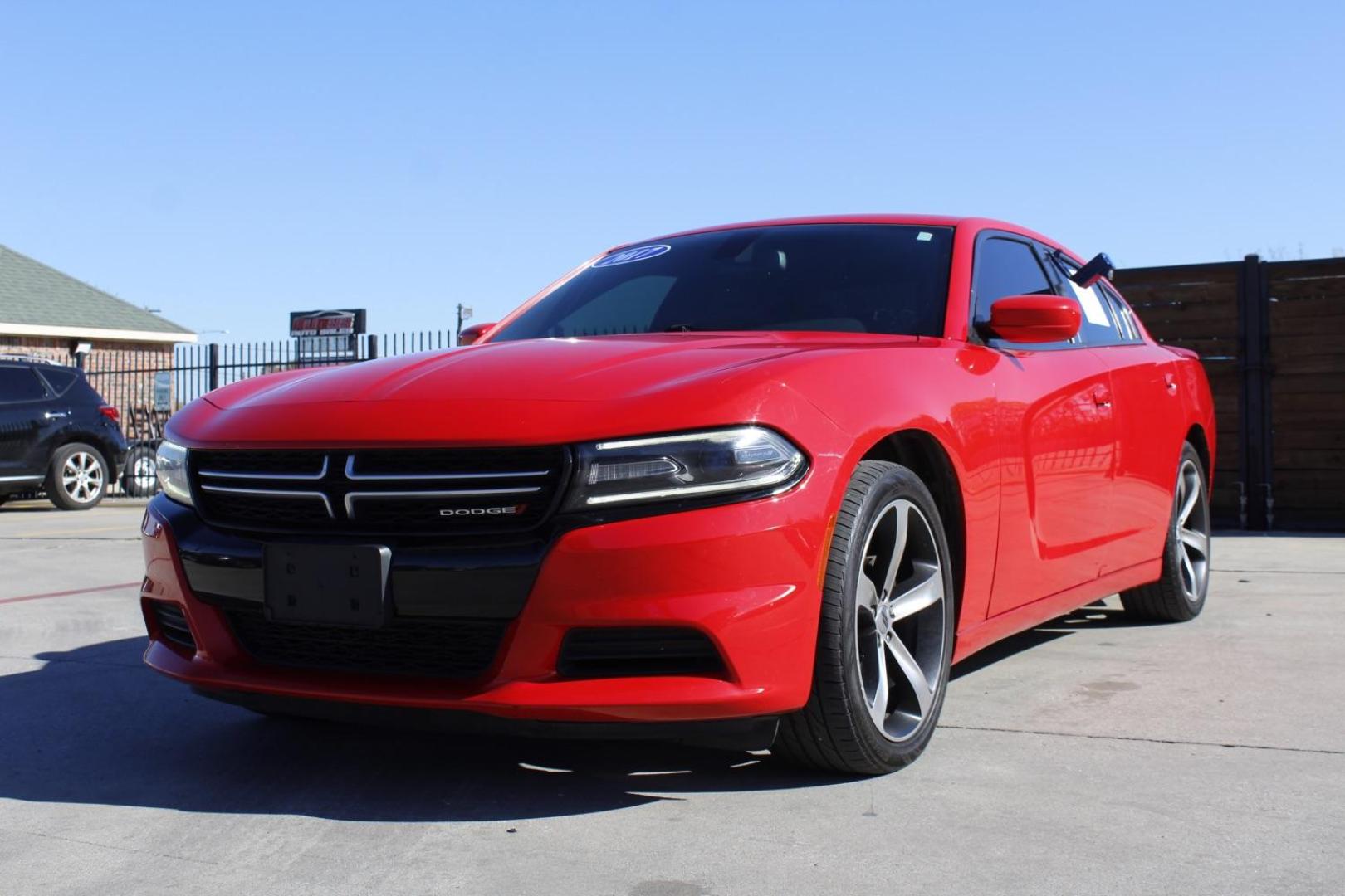 2017 red Dodge Charger SE (2C3CDXBG8HH) with an 3.6L V6 DOHC 24V engine, 8-Speed Automatic transmission, located at 2401 E Main St., Grand Prairie, TX, 75050, (972) 262-4440, 32.748981, -96.969643 - Photo#1