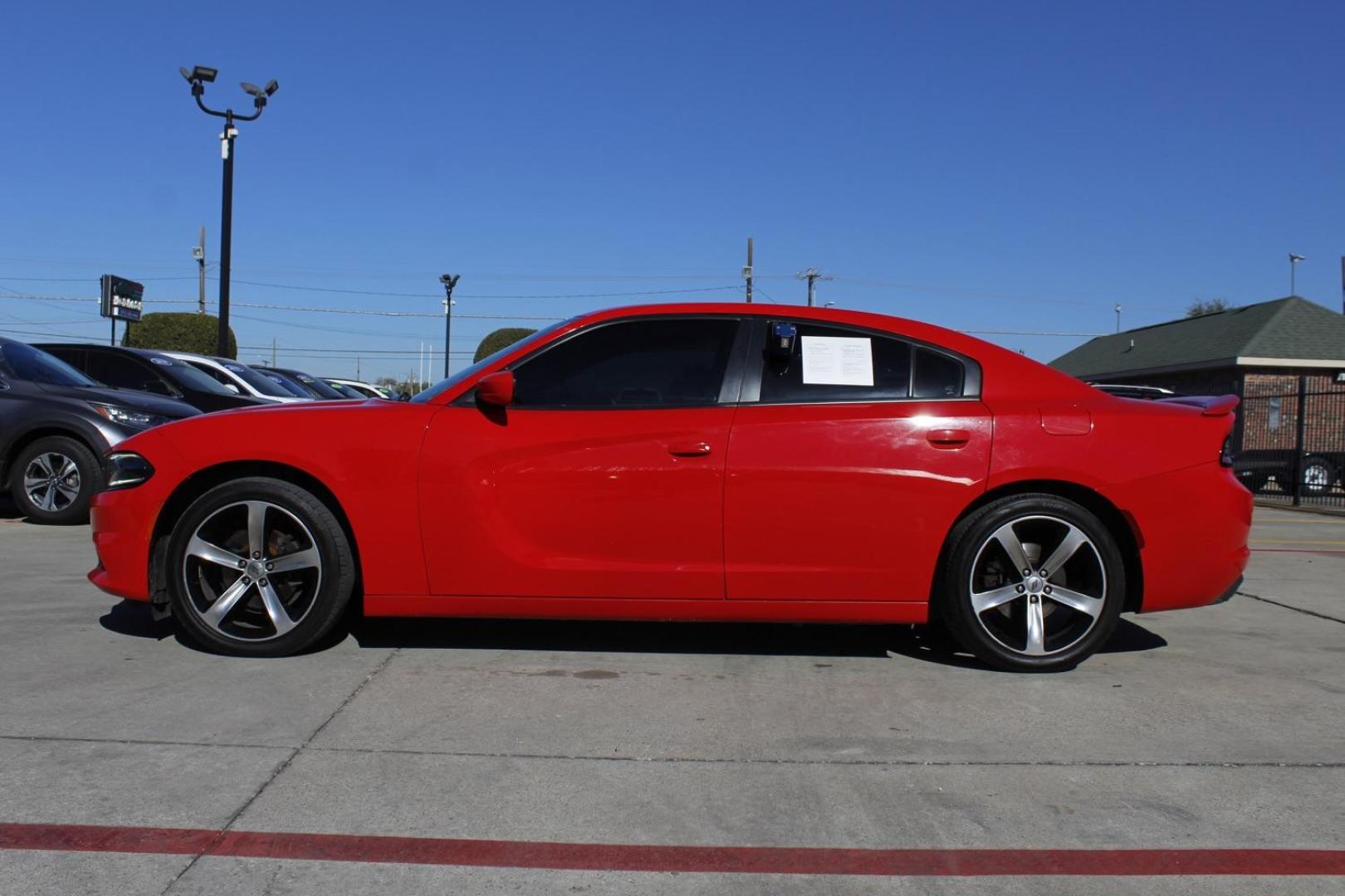 2017 red Dodge Charger SE (2C3CDXBG8HH) with an 3.6L V6 DOHC 24V engine, 8-Speed Automatic transmission, located at 2401 E Main St., Grand Prairie, TX, 75050, (972) 262-4440, 32.748981, -96.969643 - Photo#2