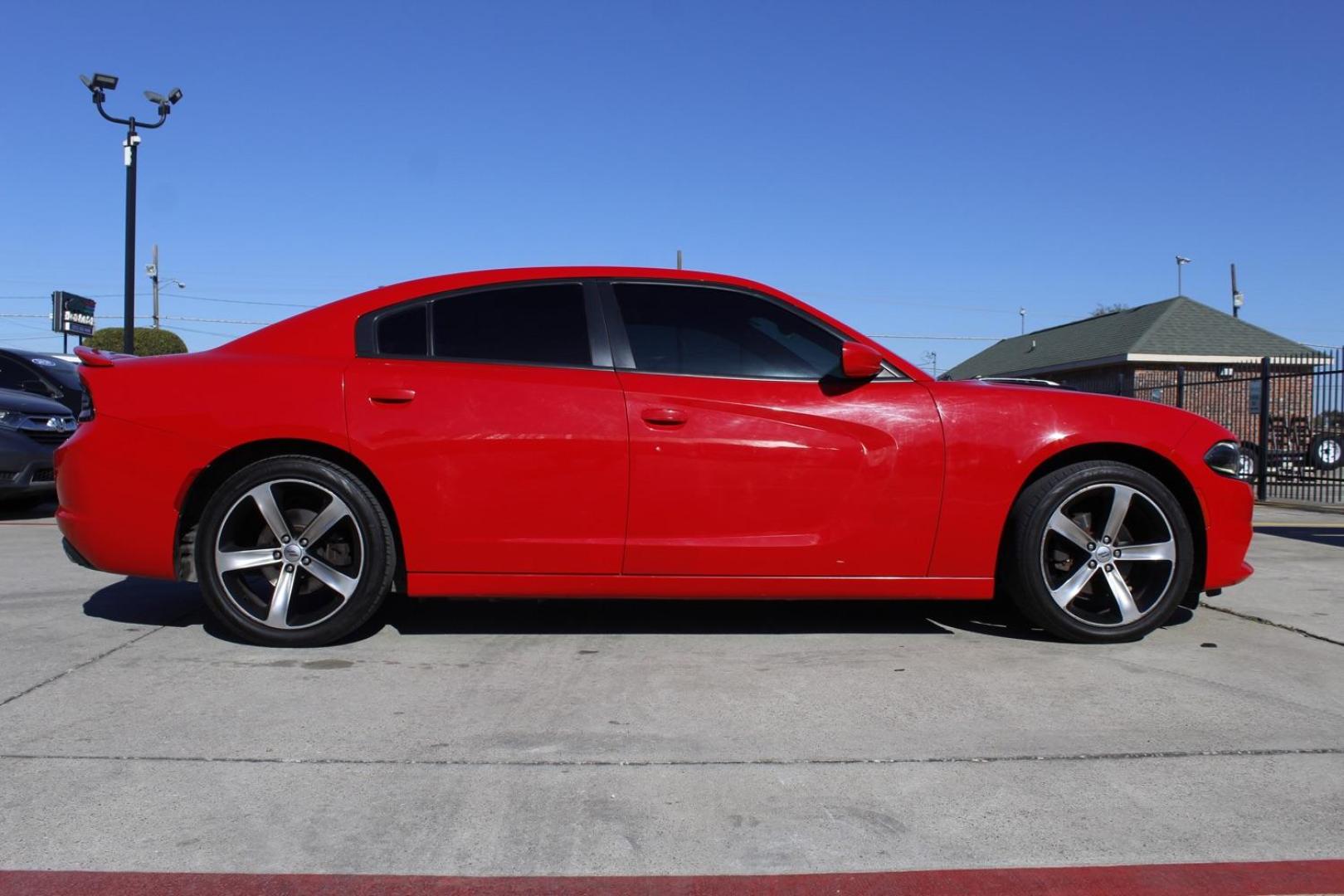 2017 red Dodge Charger SE (2C3CDXBG8HH) with an 3.6L V6 DOHC 24V engine, 8-Speed Automatic transmission, located at 2401 E Main St., Grand Prairie, TX, 75050, (972) 262-4440, 32.748981, -96.969643 - Photo#6