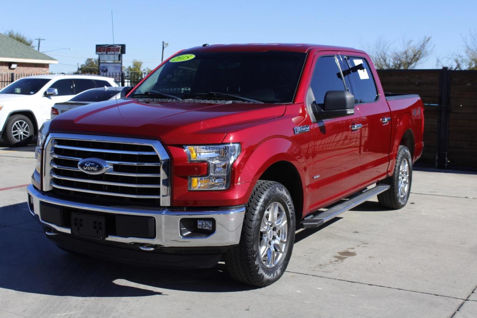 2015 red Ford F-150 XLT SuperCrew 6.5-ft. Bed 4WD (1FTEW1EP5FK) with an 2.7L V6 DOHC 24V engine, 6-Speed Automatic transmission, located at 2401 E Main St., Grand Prairie, TX, 75050, (972) 262-4440, 32.748981, -96.969643 - Photo#1