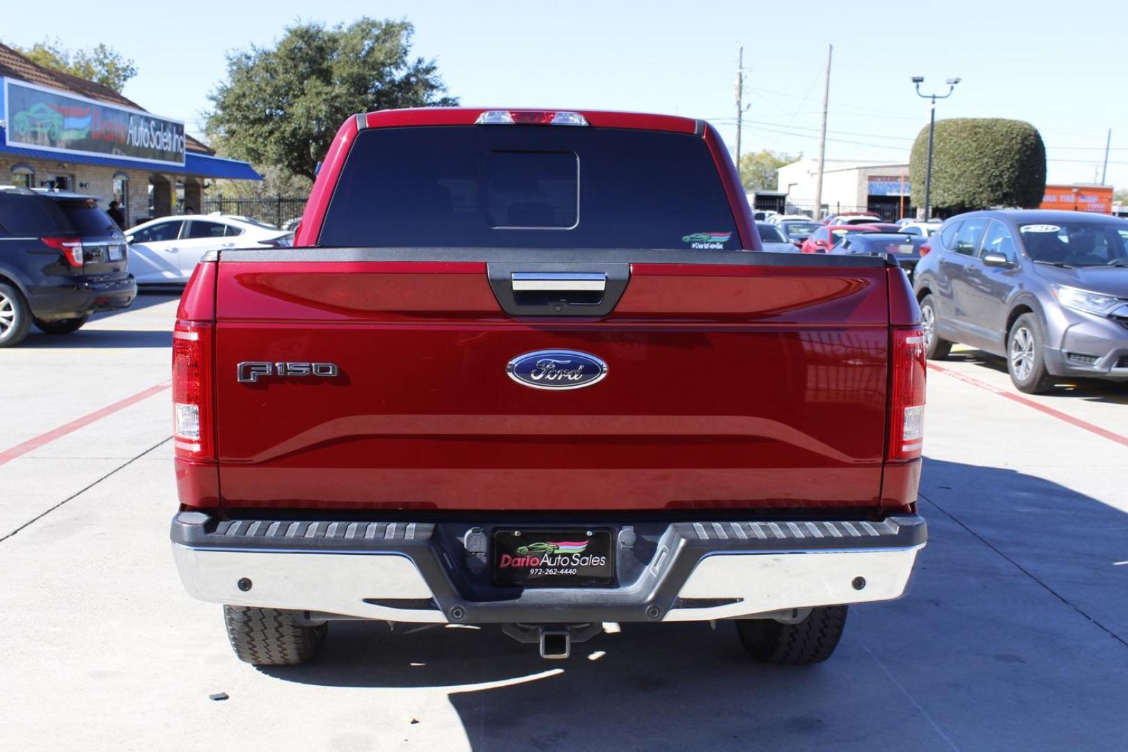 2015 red Ford F-150 XLT SuperCrew 6.5-ft. Bed 4WD (1FTEW1EP5FK) with an 2.7L V6 DOHC 24V engine, 6-Speed Automatic transmission, located at 2401 E Main St., Grand Prairie, TX, 75050, (972) 262-4440, 32.748981, -96.969643 - Photo#3