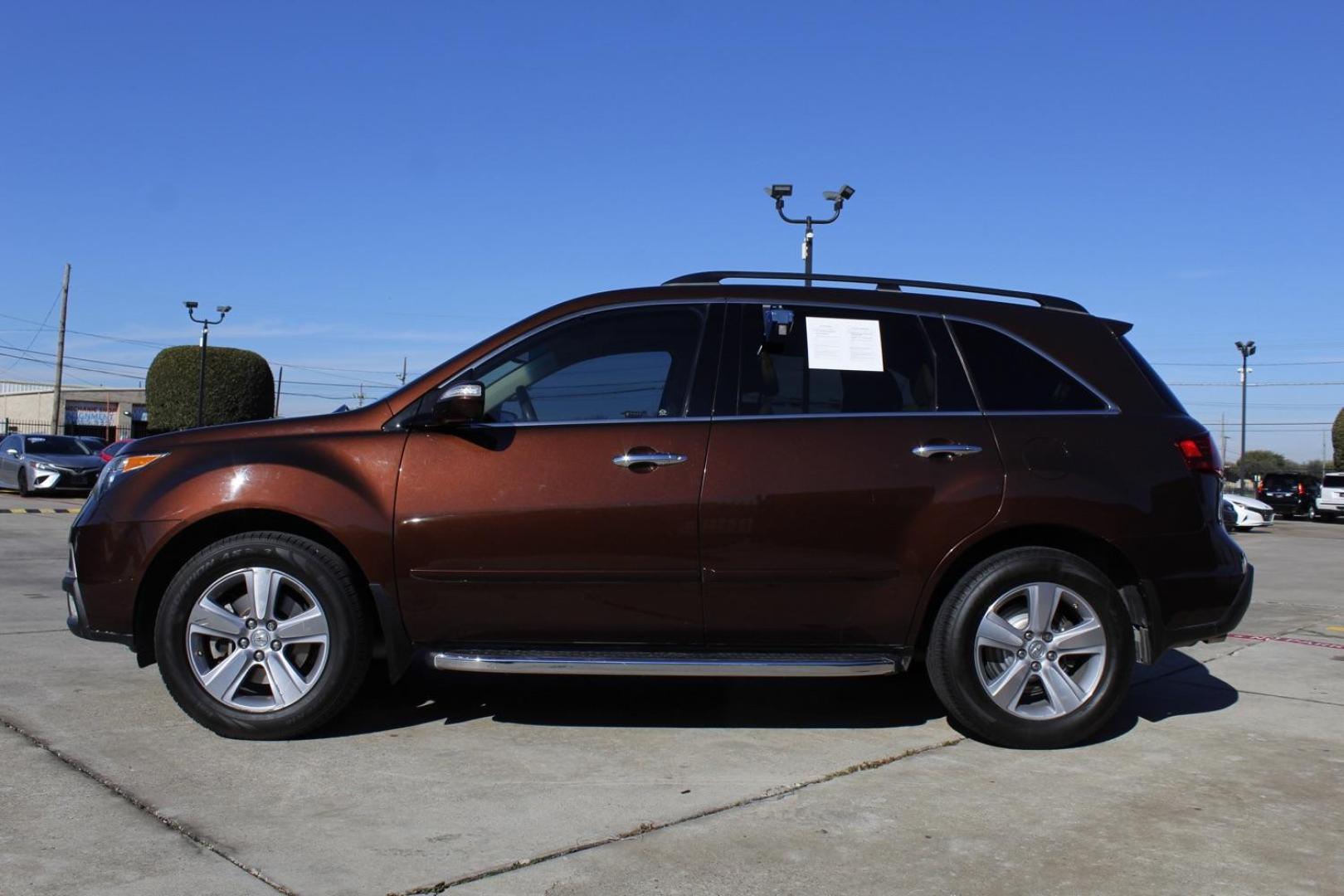 2011 brown Acura MDX 6-Spd AT w/Tech Package (2HNYD2H69BH) with an 3.7L V6 SOHC 24V engine, 6-Speed Automatic transmission, located at 2401 E Main St., Grand Prairie, TX, 75050, (972) 262-4440, 32.748981, -96.969643 - Photo#1