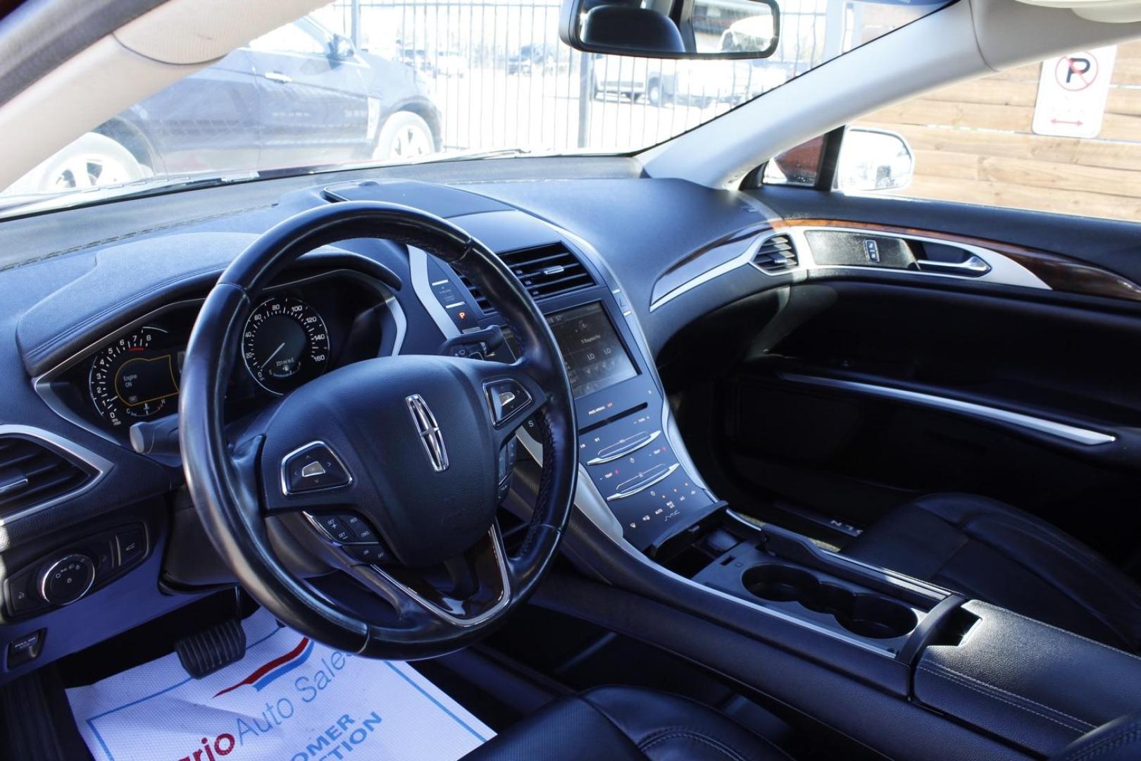 2016 brown Lincoln MKZ FWD (3LN6L2G98GR) with an 2.0L L4 DOHC 16V engine, 6-Speed Automatic transmission, located at 2401 E Main St., Grand Prairie, TX, 75050, (972) 262-4440, 32.748981, -96.969643 - Photo#10