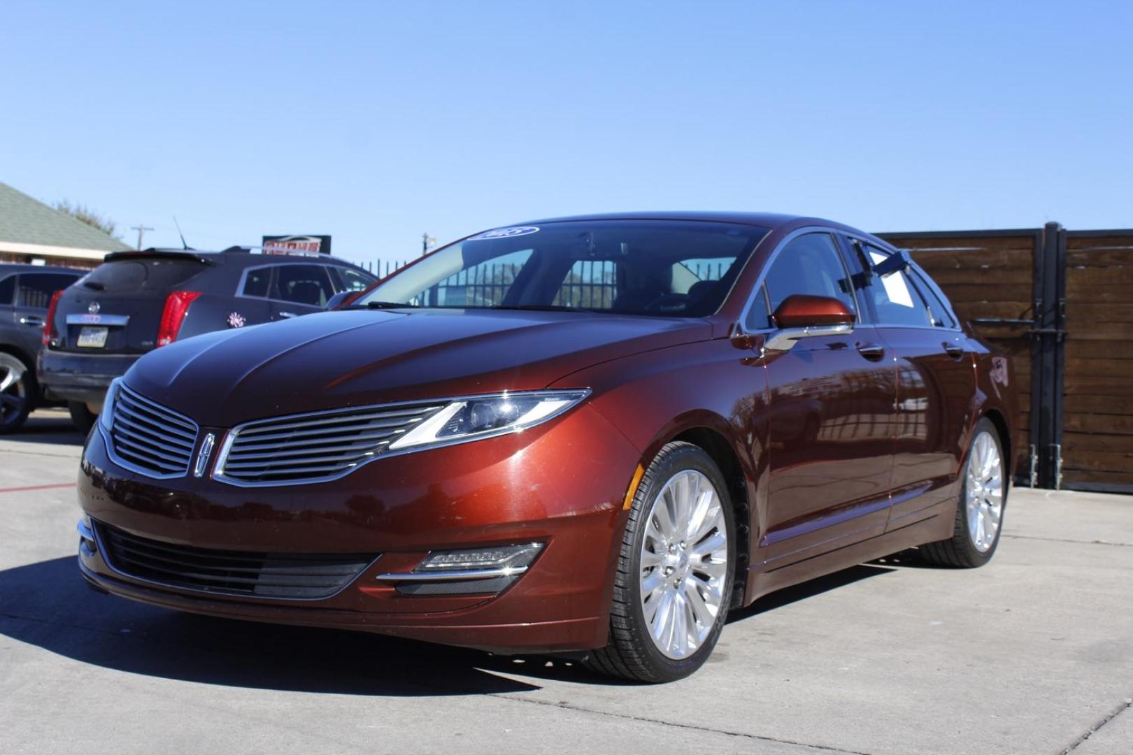 2016 brown Lincoln MKZ FWD (3LN6L2G98GR) with an 2.0L L4 DOHC 16V engine, 6-Speed Automatic transmission, located at 2401 E Main St., Grand Prairie, TX, 75050, (972) 262-4440, 32.748981, -96.969643 - Photo#1