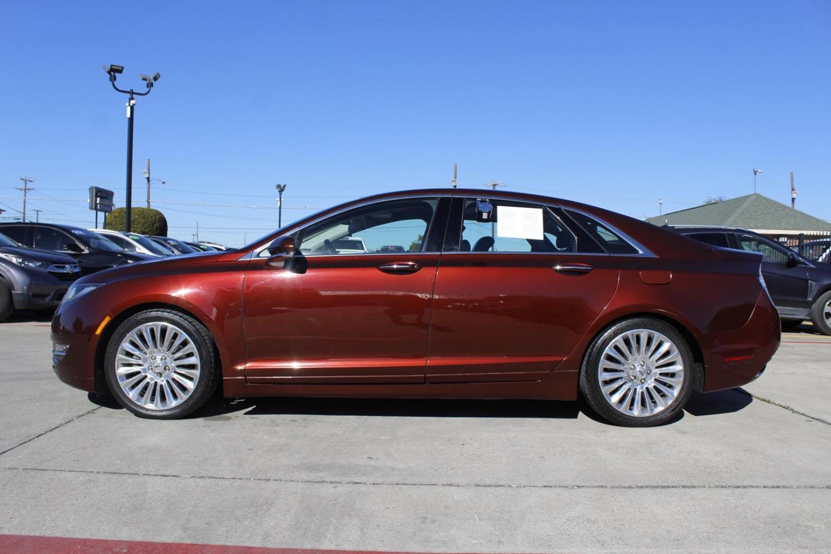 2016 brown Lincoln MKZ FWD (3LN6L2G98GR) with an 2.0L L4 DOHC 16V engine, 6-Speed Automatic transmission, located at 2401 E Main St., Grand Prairie, TX, 75050, (972) 262-4440, 32.748981, -96.969643 - Photo#2