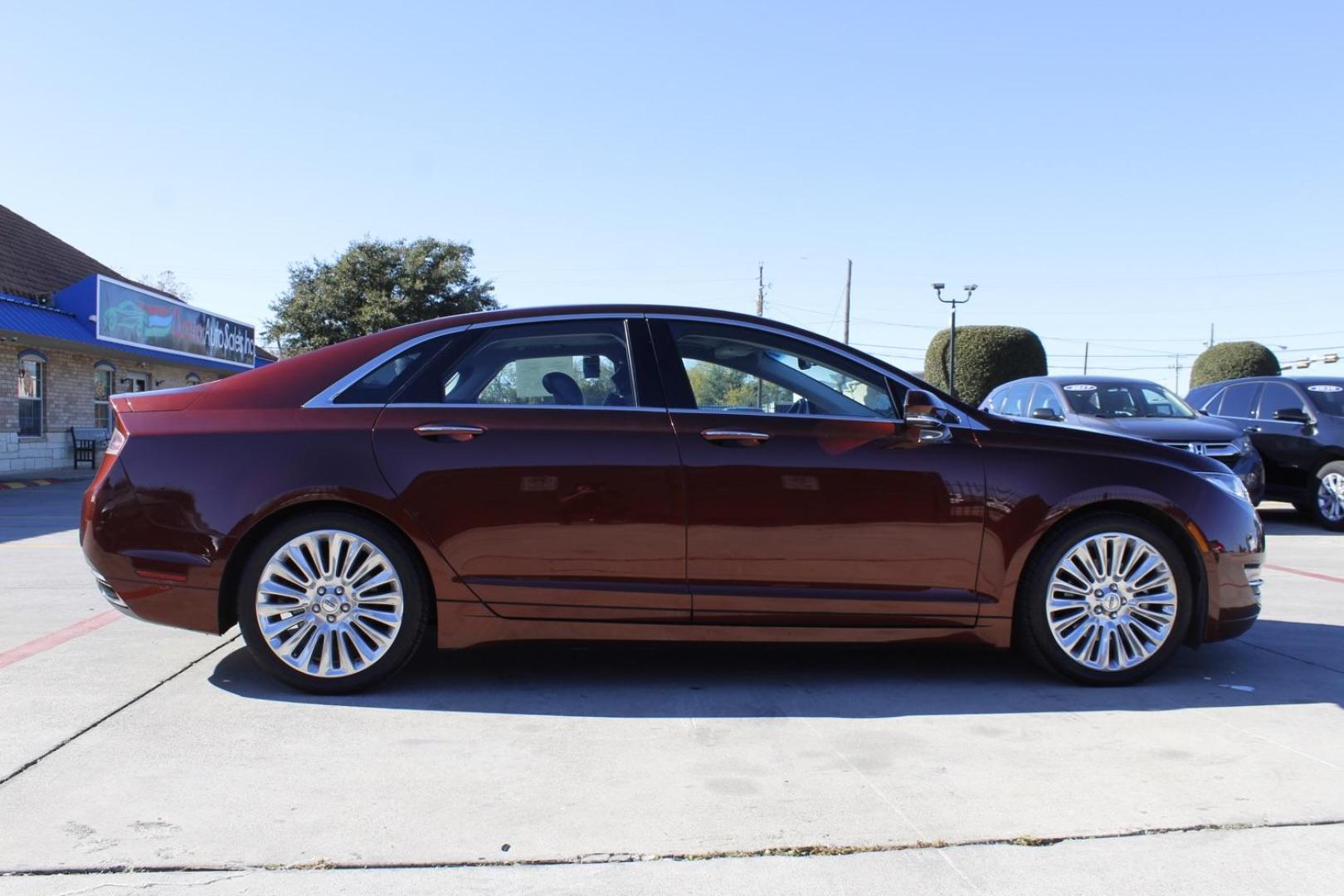 2016 brown Lincoln MKZ FWD (3LN6L2G98GR) with an 2.0L L4 DOHC 16V engine, 6-Speed Automatic transmission, located at 2401 E Main St., Grand Prairie, TX, 75050, (972) 262-4440, 32.748981, -96.969643 - Photo#7